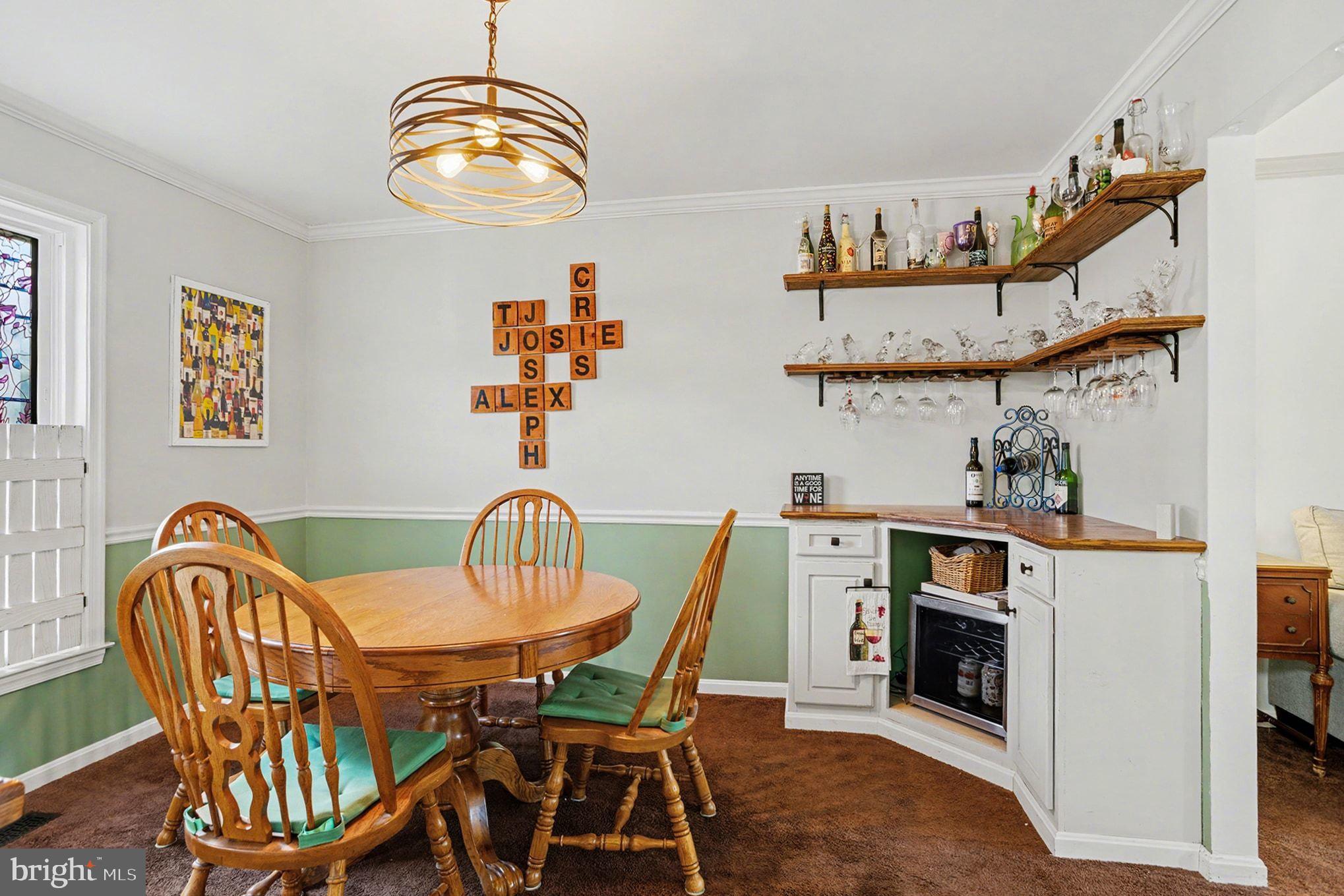 4400 Cottington Road Nottingham, MD 21236 - Photo 6 of 48 a view of a dining room with furniture wooden floor and a chandelier