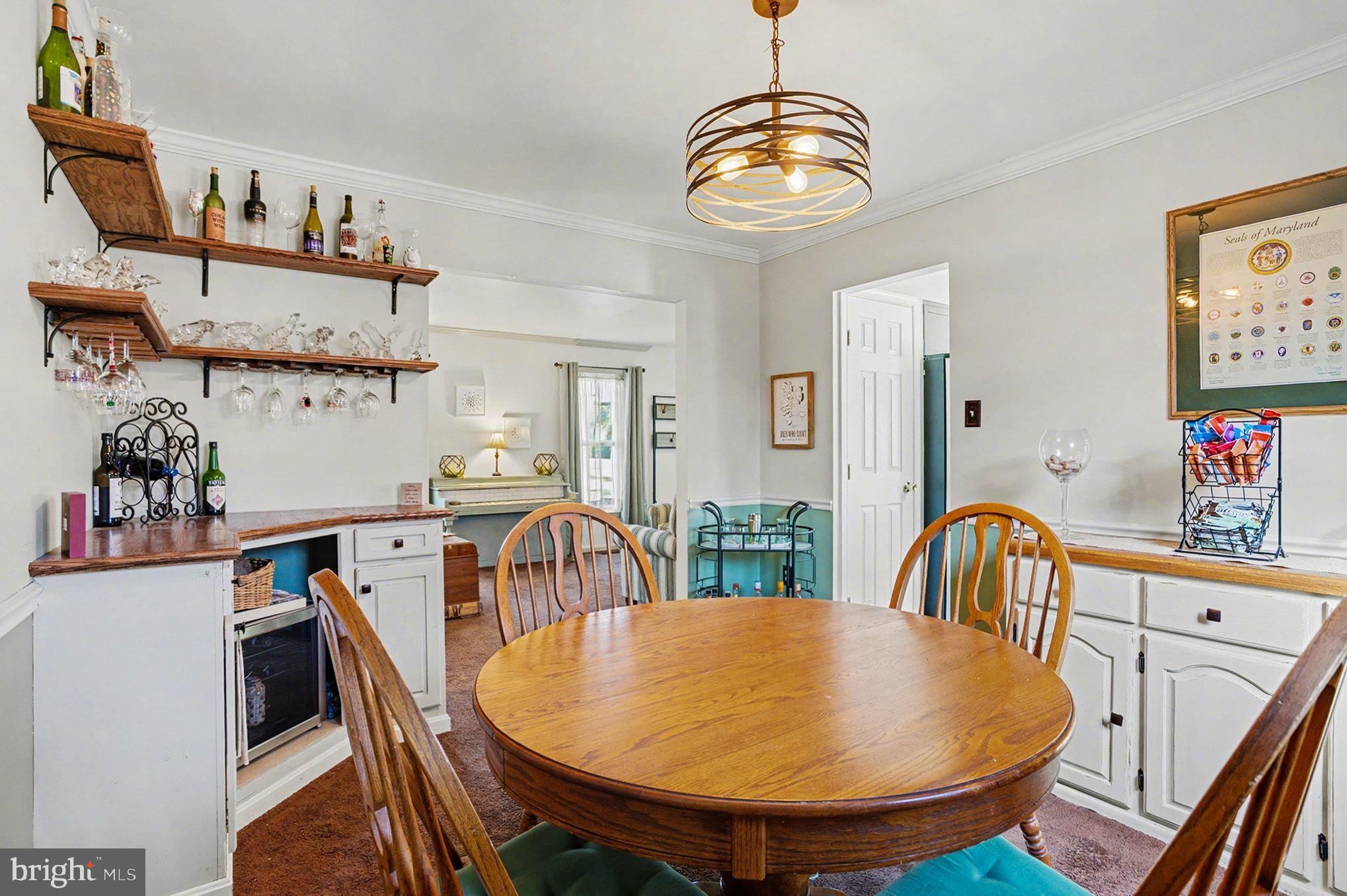 4400 Cottington Road Nottingham, MD 21236 - Photo 8 of 48 a dining room with furniture and window