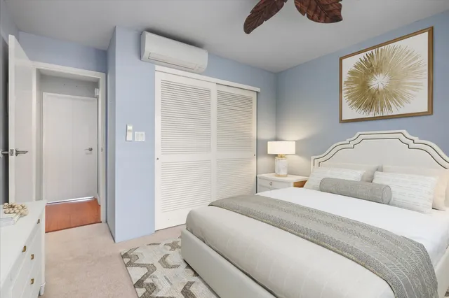 a view of a swimming pool with sitting area