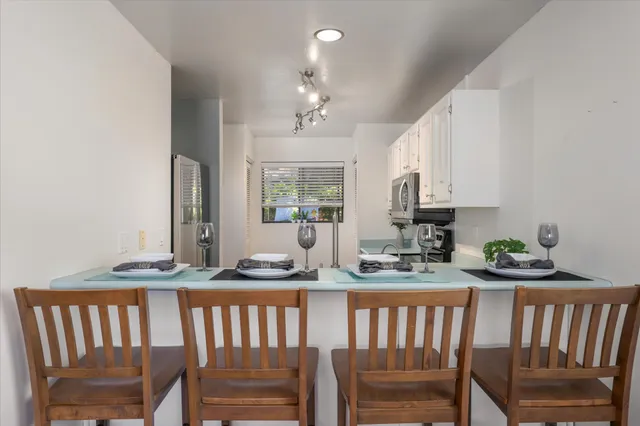 a view of kitchen with sink and window