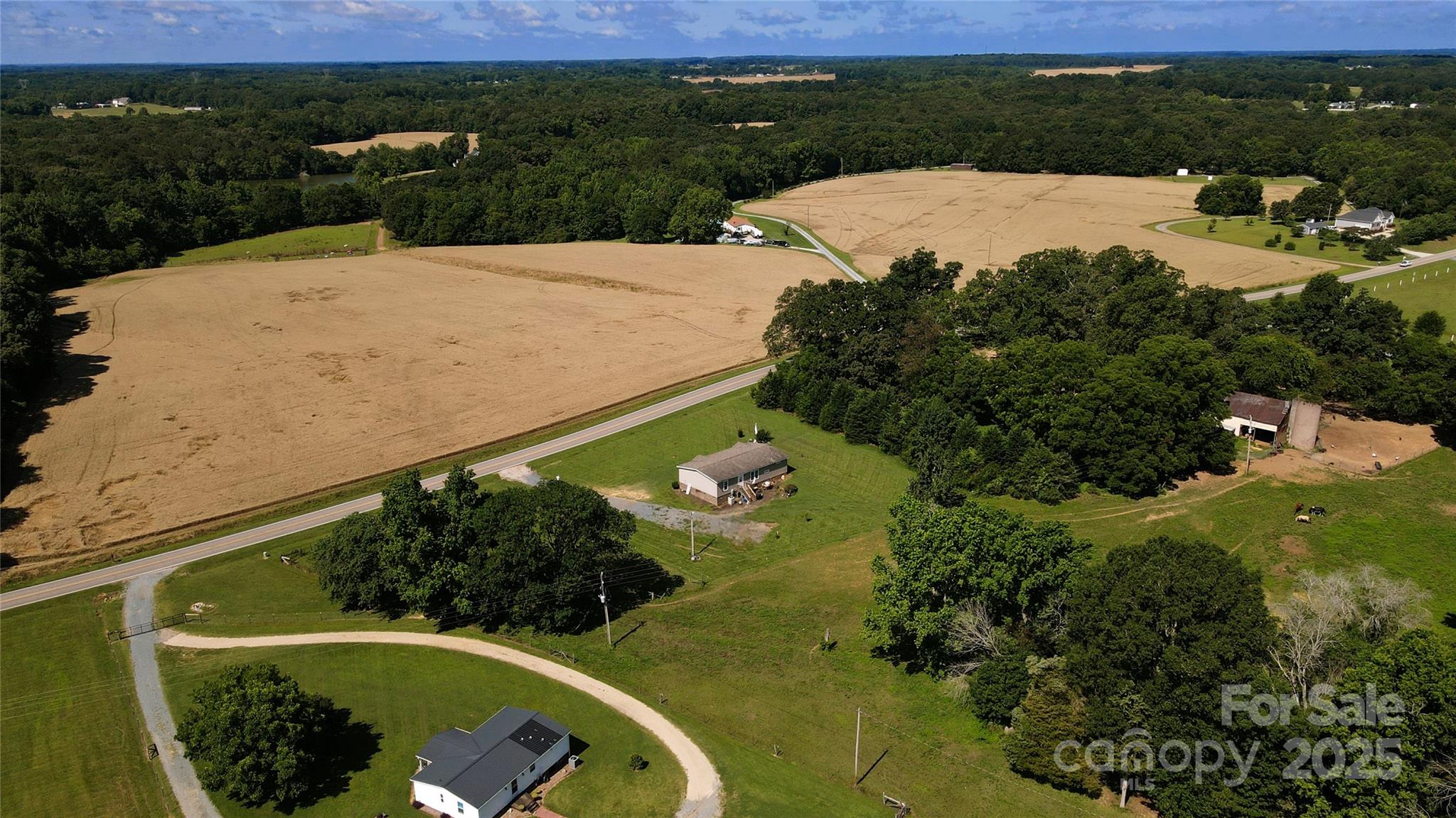 4713 White Store Road Wingate, NC 28174 - Photo 40 of 44 an aerial view of a house with a yard