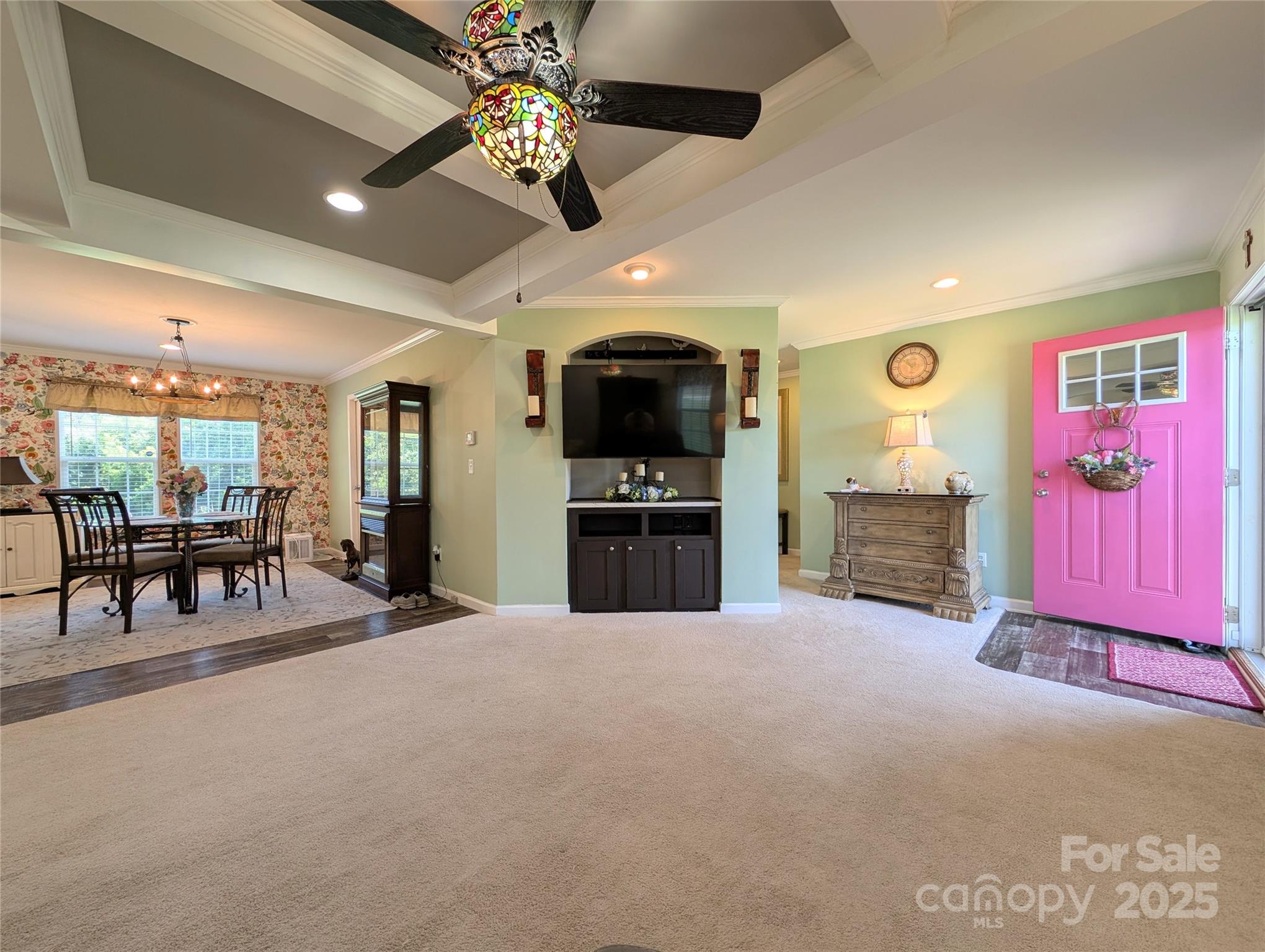 4713 White Store Road Wingate, NC 28174 - Photo 4 of 44 a large living room with stainless steel appliances kitchen island granite countertop furniture and a flat screen tv