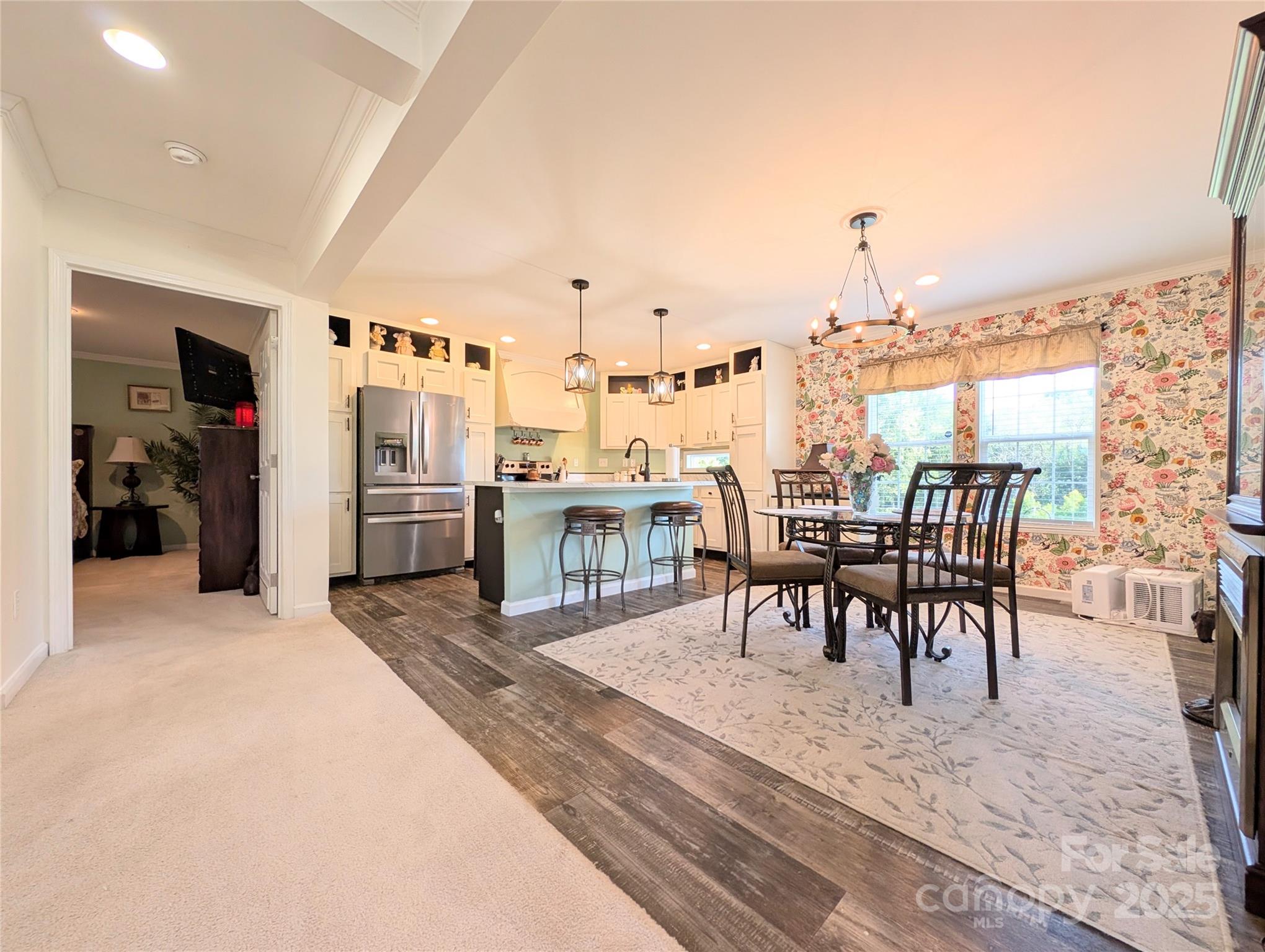 4713 White Store Road Wingate, NC 28174 - Photo 5 of 44 a dining room with furniture and a view of living room