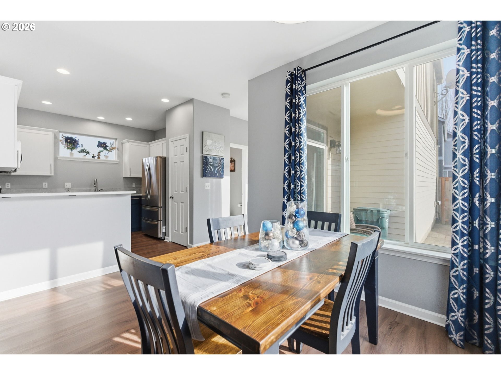6144 Southwest 208th Place Beaverton, OR 97078 - Photo 12 of 41 a view of a dining room with furniture and window