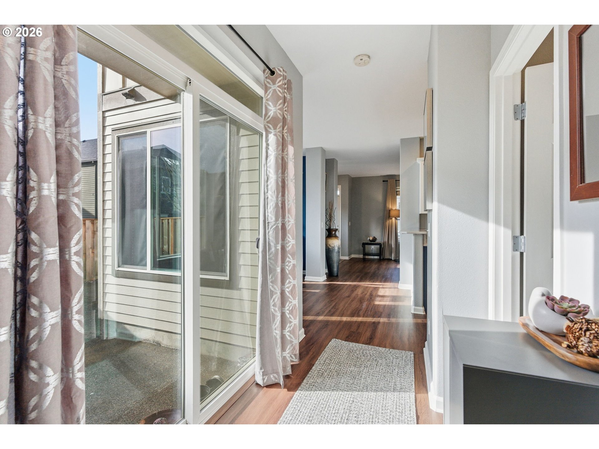 6144 Southwest 208th Place Beaverton, OR 97078 - Photo 18 of 41 a view of a bathroom with a glass door and a window