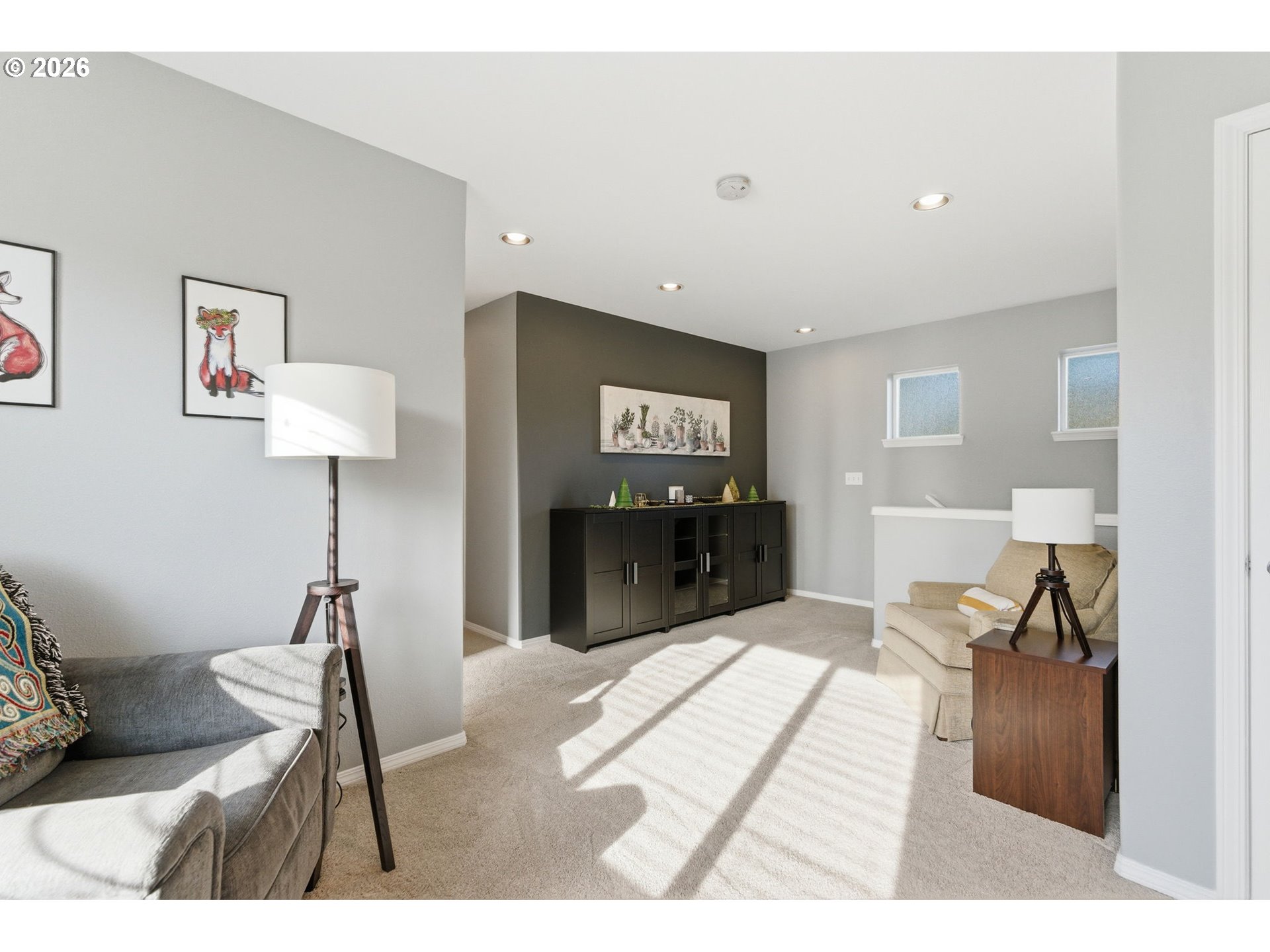 6144 Southwest 208th Place Beaverton, OR 97078 - Photo 21 of 41 a living room with furniture and a dining table
