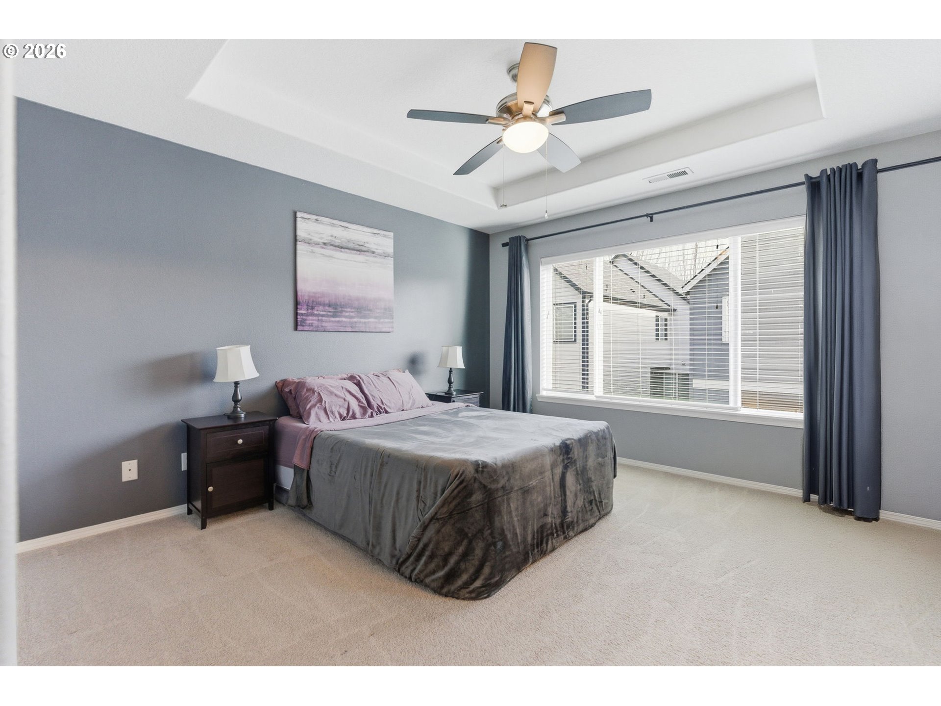 6144 Southwest 208th Place Beaverton, OR 97078 - Photo 24 of 41 a bedroom with a bed and window