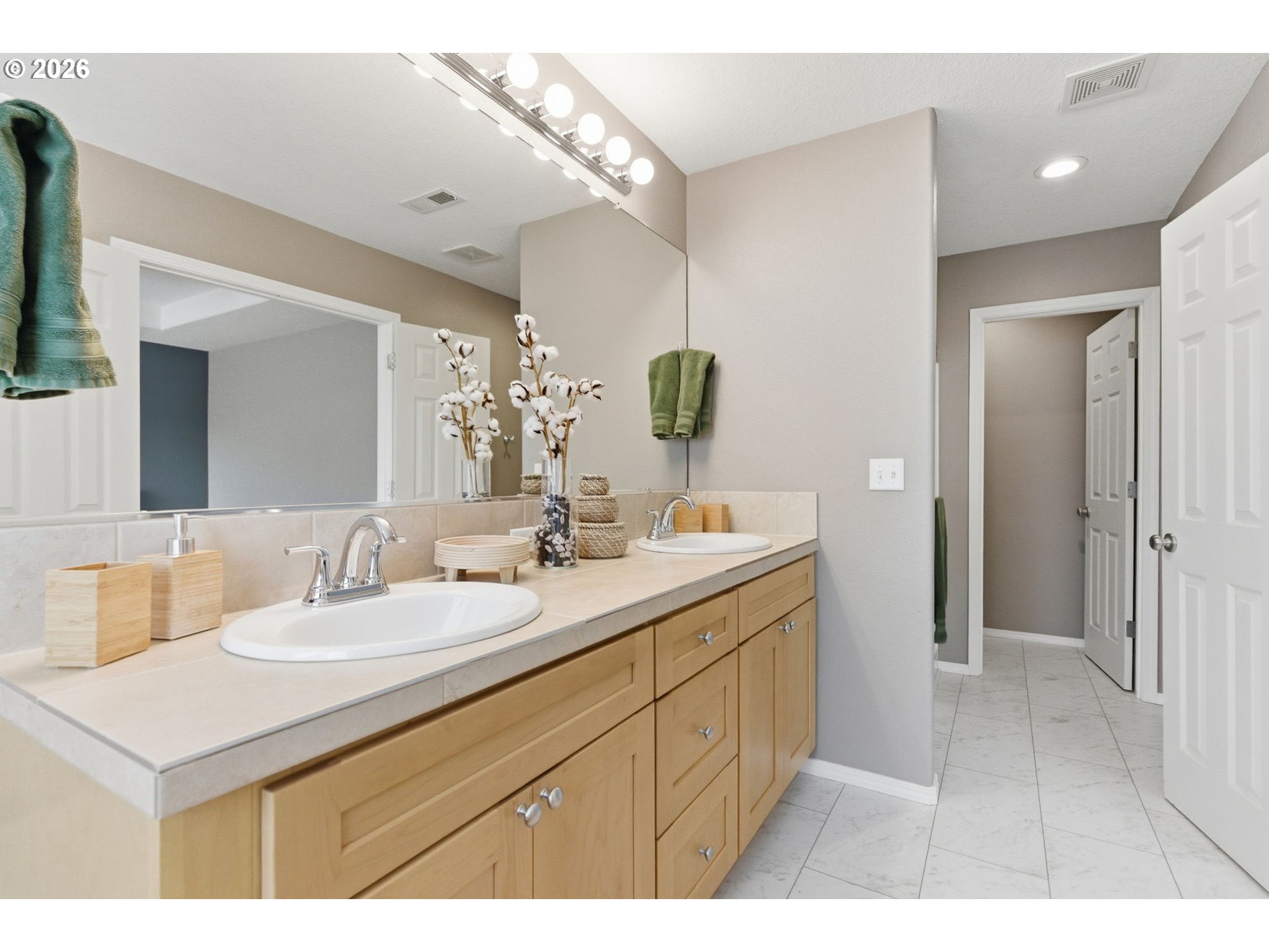 6144 Southwest 208th Place Beaverton, OR 97078 - Photo 27 of 41 a bathroom with a sink and a mirror