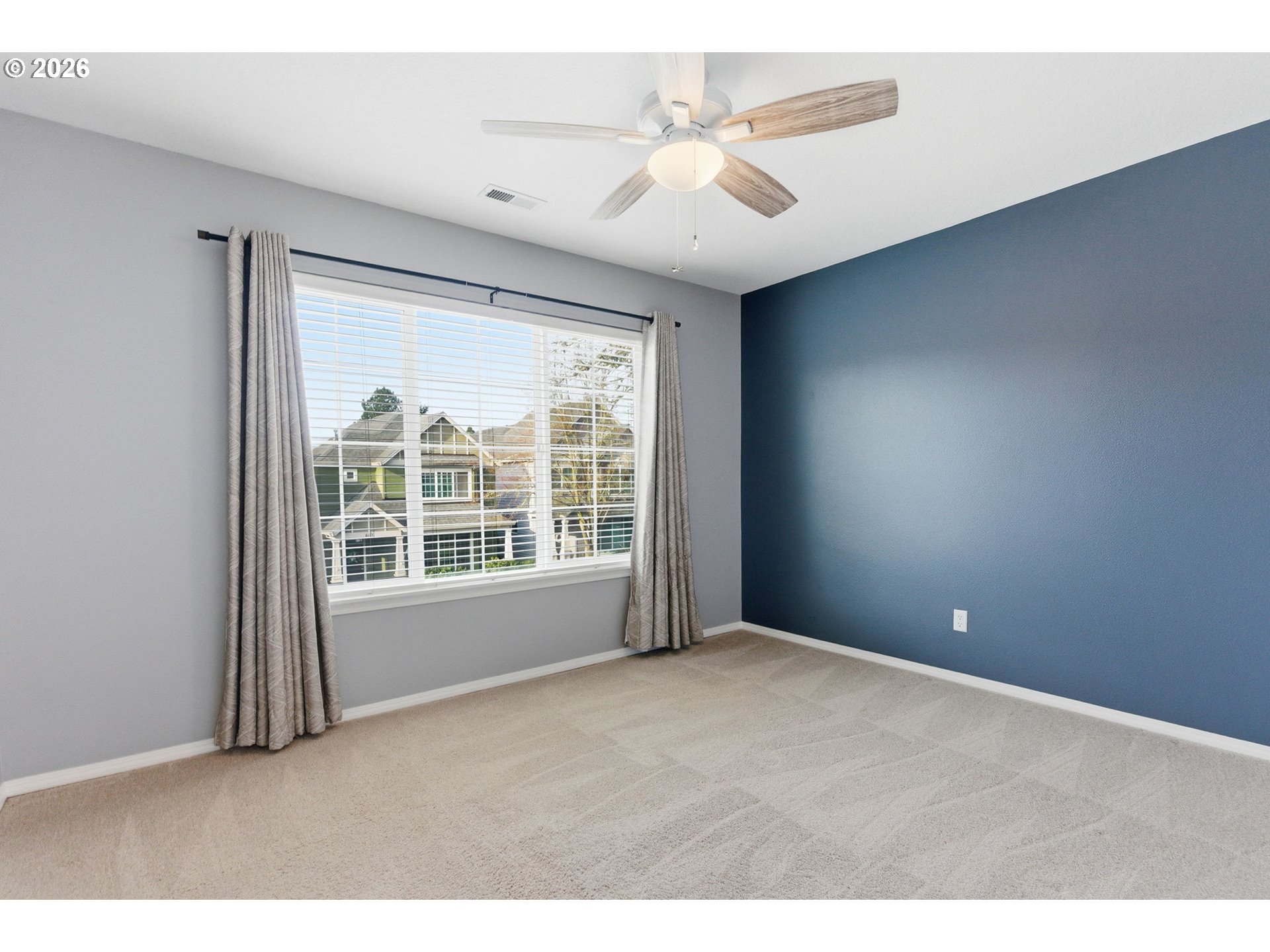 6144 Southwest 208th Place Beaverton, OR 97078 - Photo 29 of 41 a view of an empty room with a window