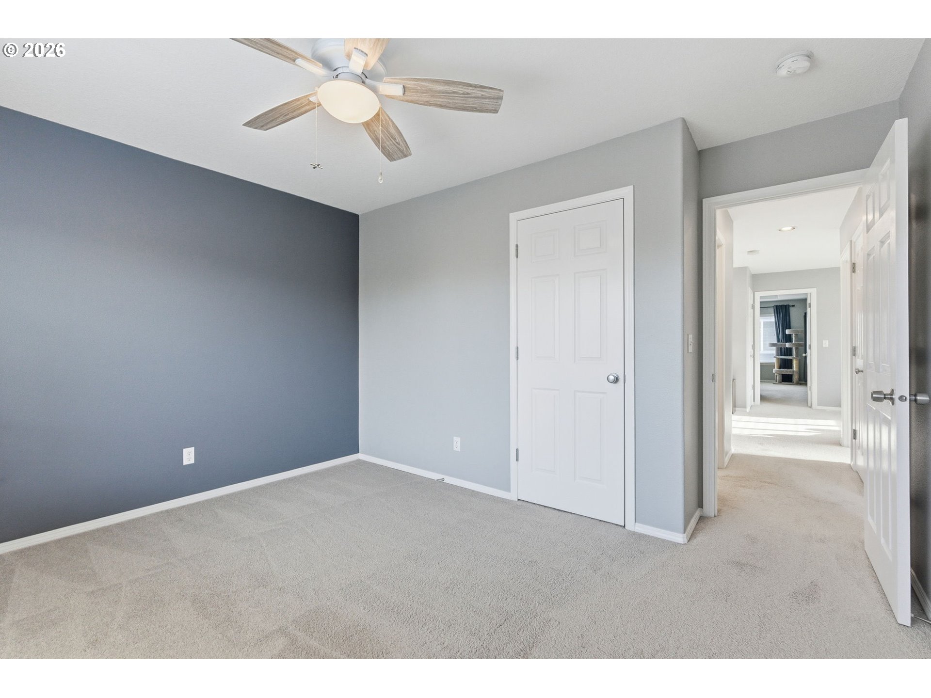 6144 Southwest 208th Place Beaverton, OR 97078 - Photo 30 of 41 a view of an empty room with a ceiling fan