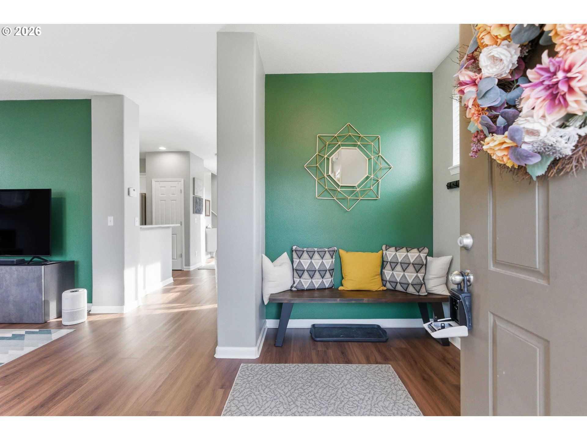 6144 Southwest 208th Place Beaverton, OR 97078 - Photo 3 of 41 a living room with furniture and a flat screen tv