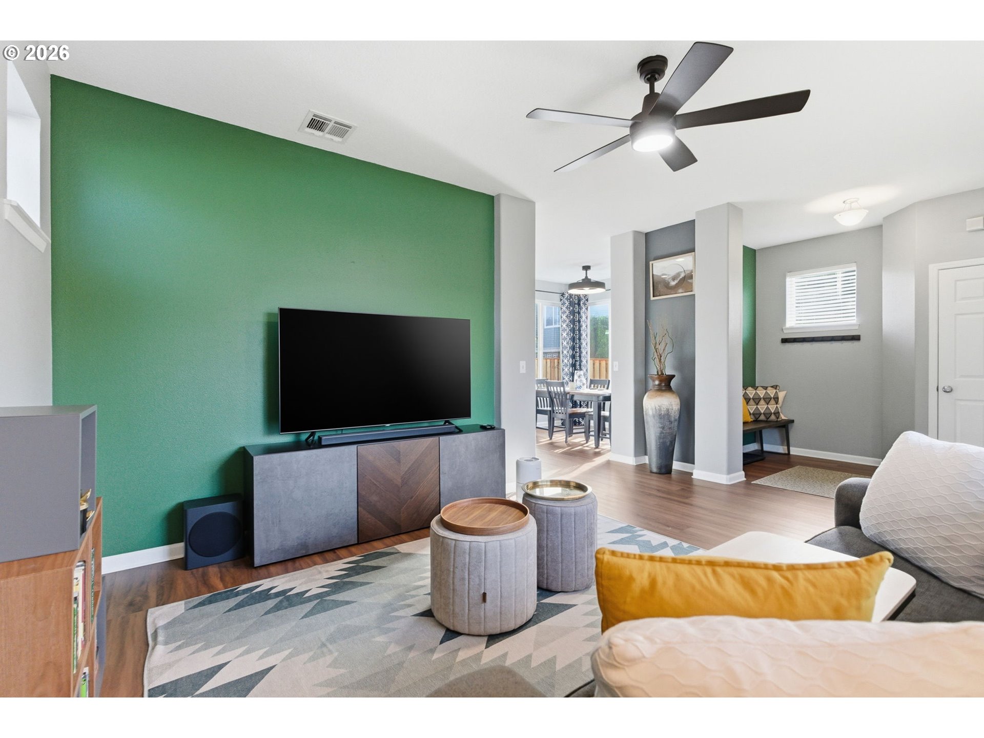 6144 Southwest 208th Place Beaverton, OR 97078 - Photo 8 of 41 a living room with furniture and a flat screen tv