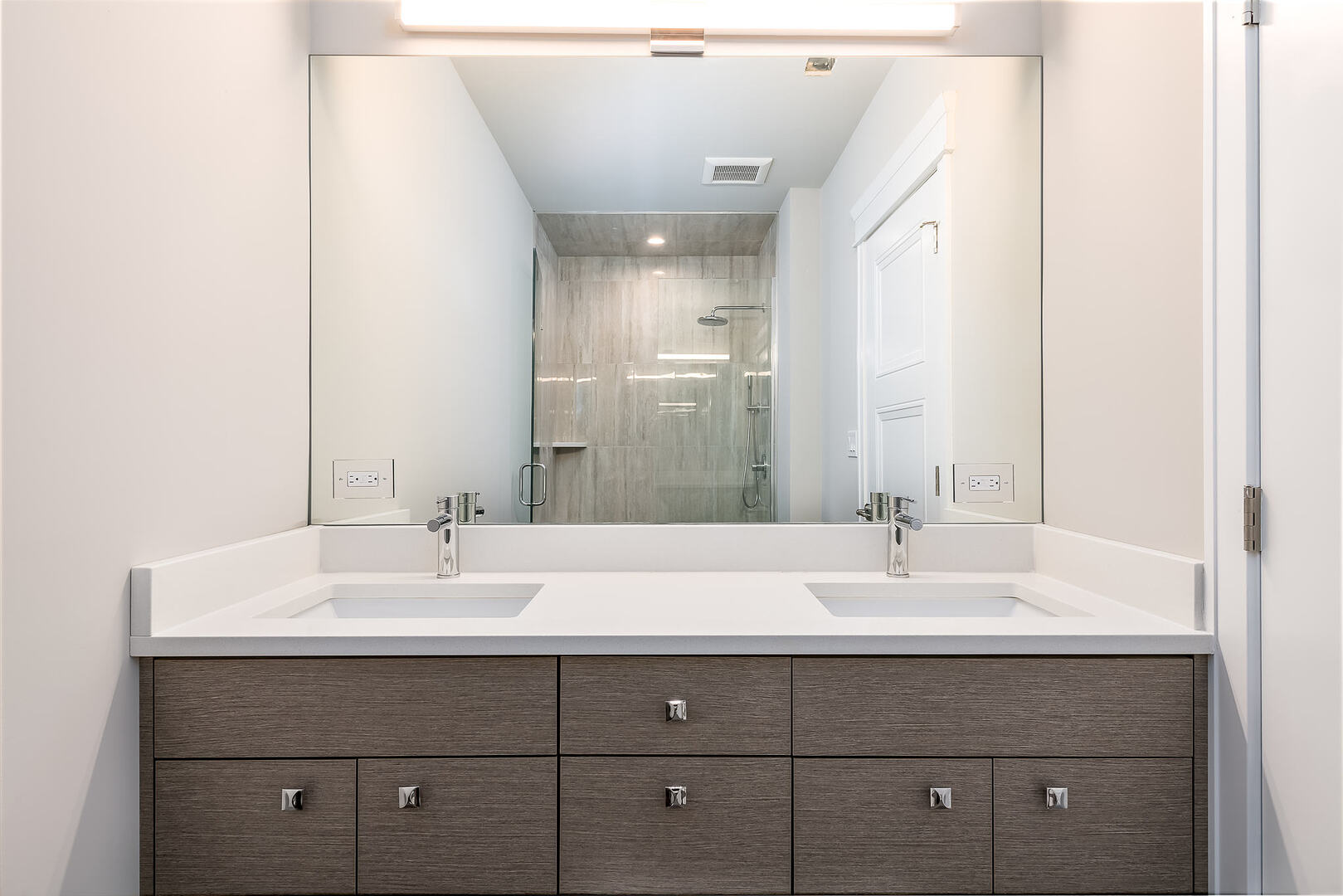 2145 South Halsted Street, Unit 4S Chicago, IL 60608 - Photo 11 of 29 a bathroom with a sink double vanity and a mirror