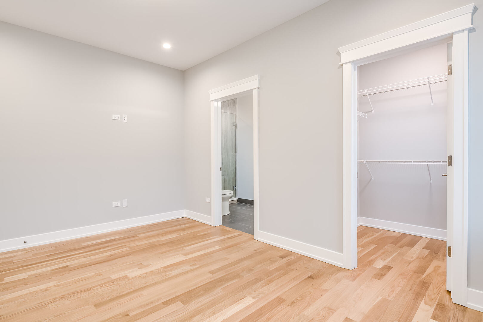 2145 South Halsted Street, Unit 4S Chicago, IL 60608 - Photo 24 of 29 a view of empty room with wooden floor