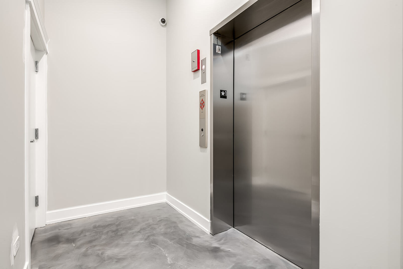 2145 South Halsted Street, Unit 4S Chicago, IL 60608 - Photo 25 of 29 a bathroom with a shower and a glass door