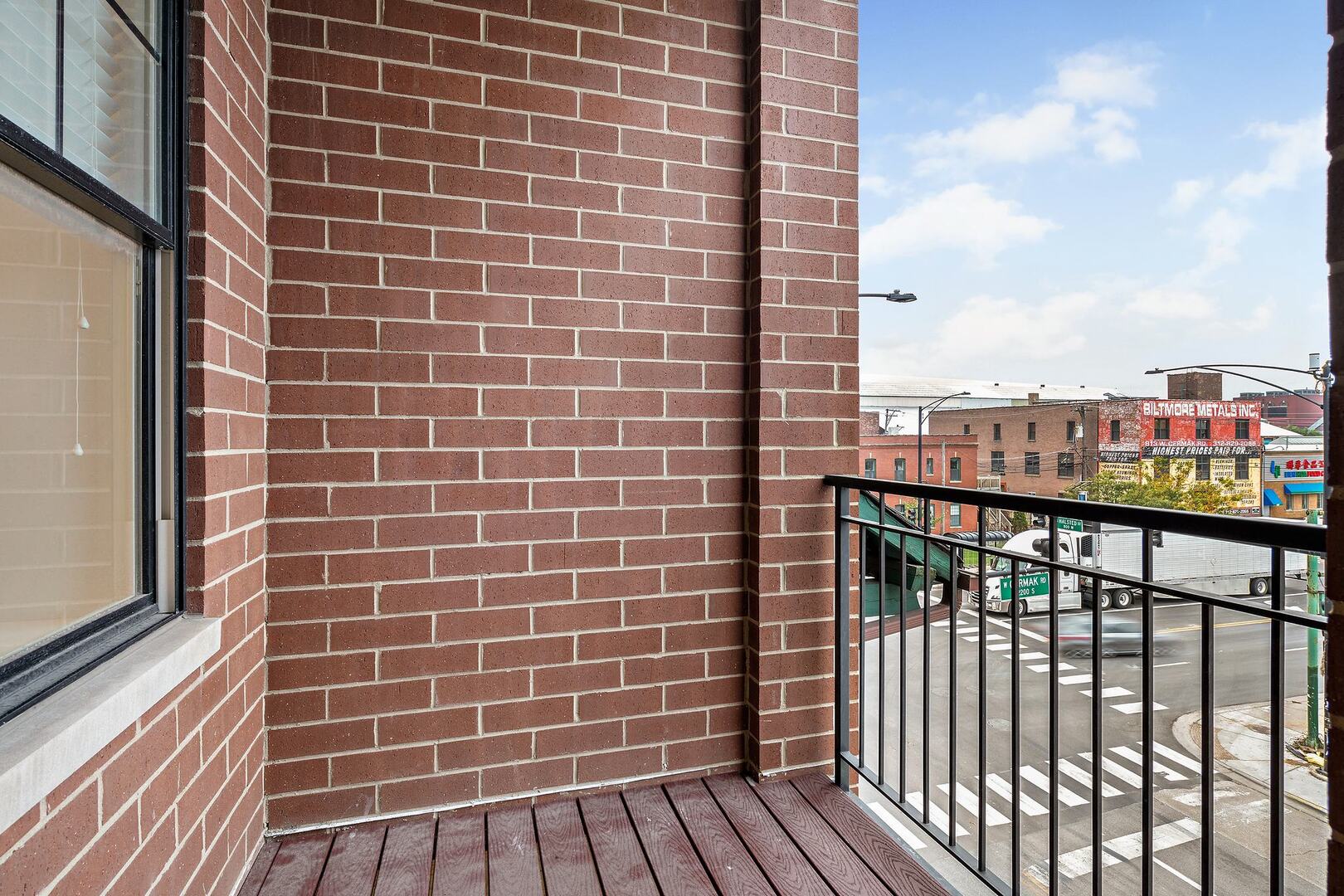 2145 South Halsted Street, Unit 4S Chicago, IL 60608 - Photo 26 of 29 a view of a balcony with a floor to ceiling window