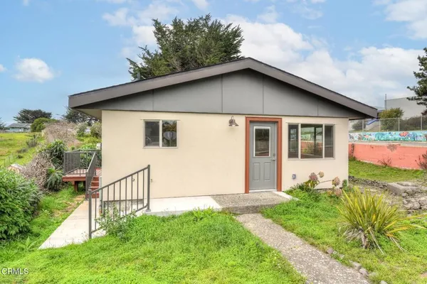 a house that has a lot of plants in it