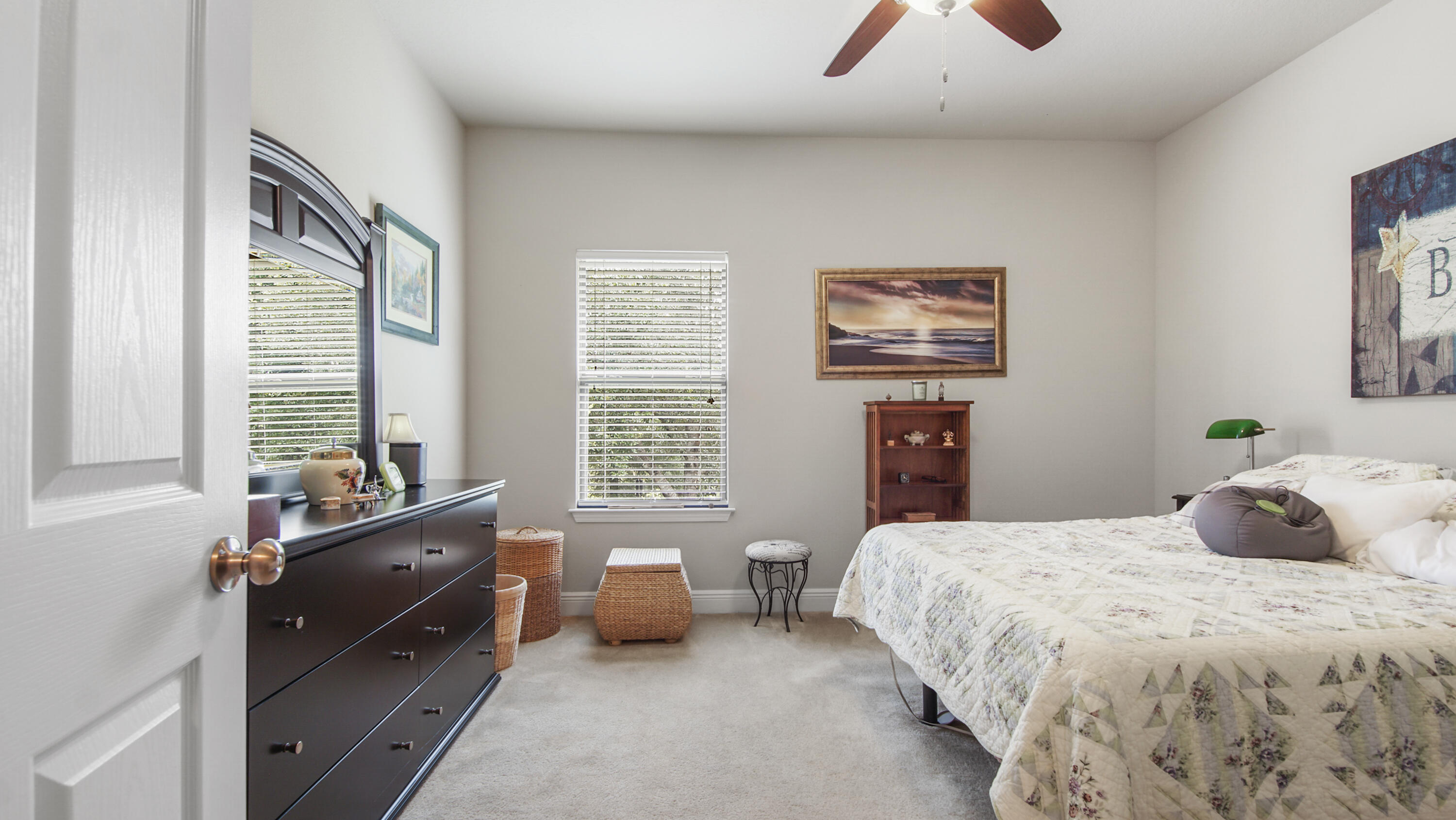 462 Mango Lane Freeport, FL 32439 - Photo 27 of 67 a bedroom with a bed and a couch