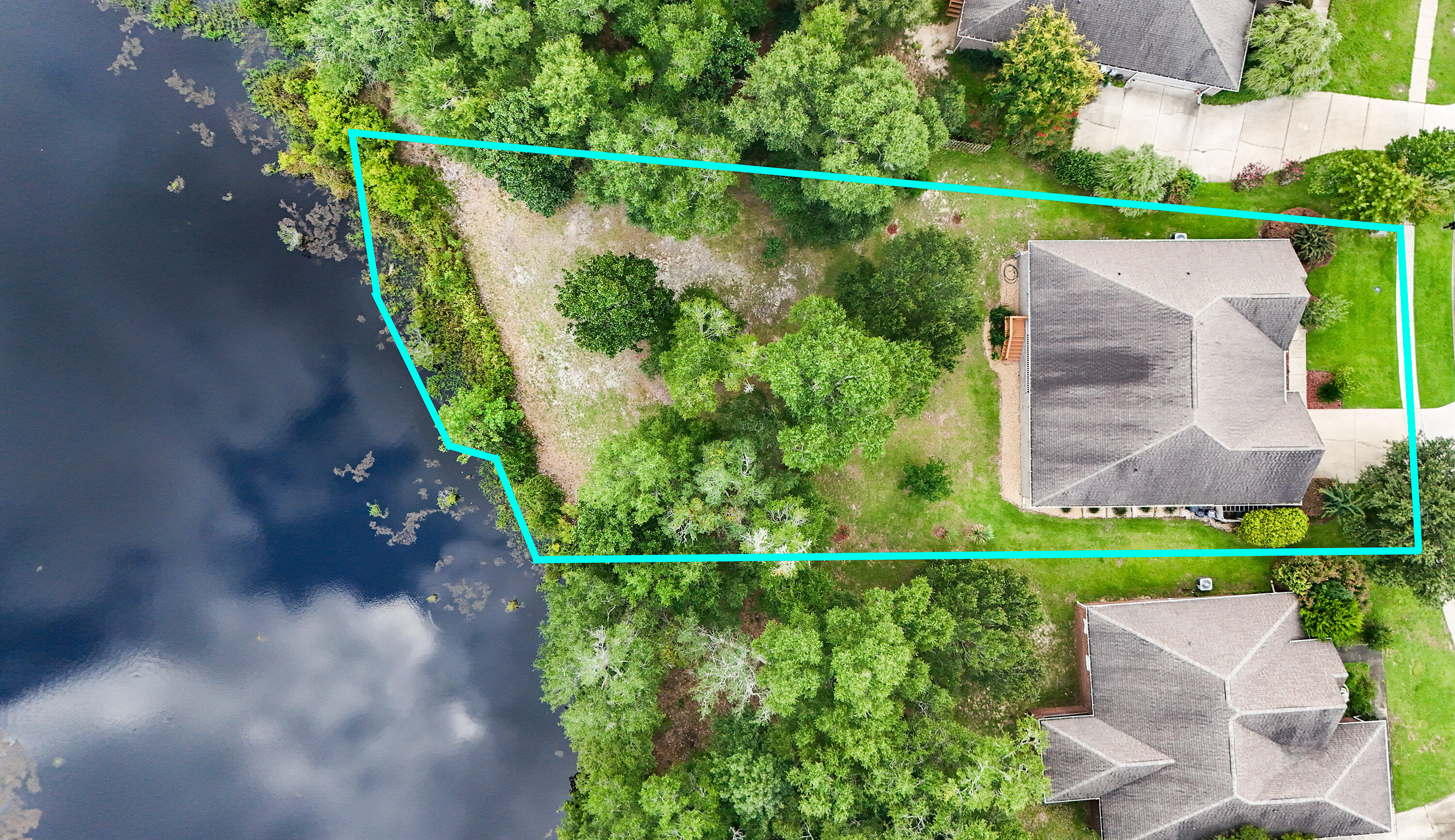 462 Mango Lane Freeport, FL 32439 - Photo 32 of 67 a view of a lake with a bridge