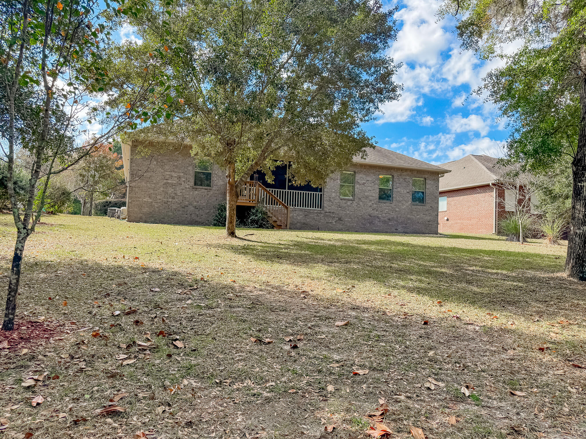 462 Mango Lane Freeport, FL 32439 - Photo 39 of 67 a view of a house with a yard