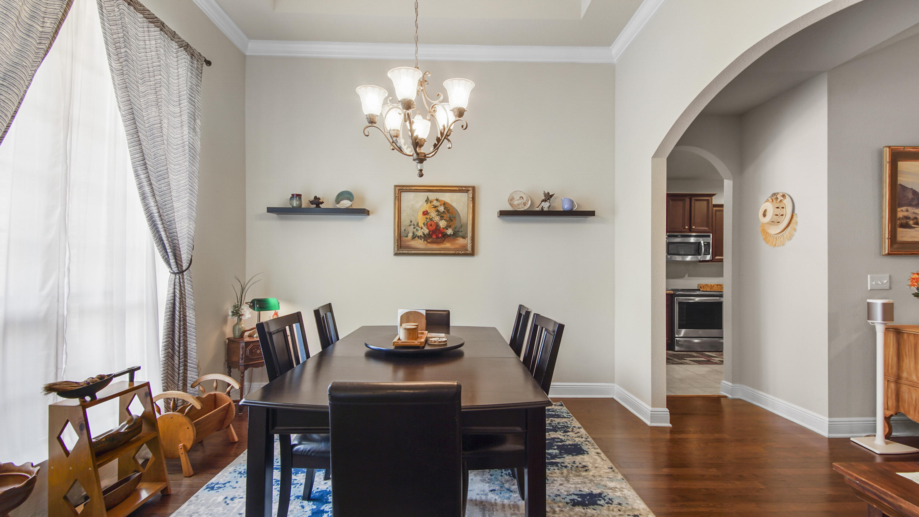 462 Mango Lane Freeport, FL 32439 - Photo 4 of 67 a view of a dining room with furniture and wooden floor