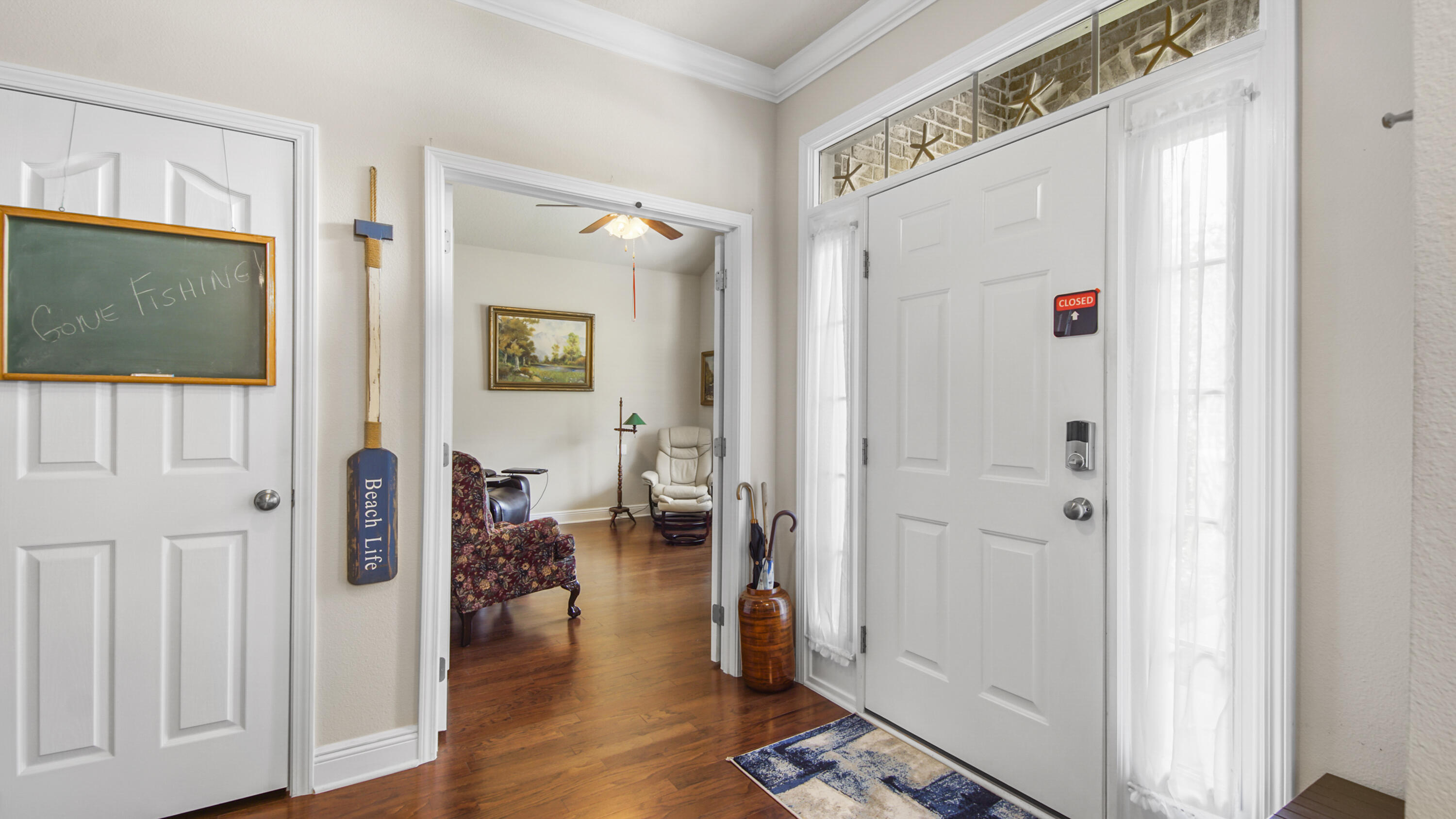 462 Mango Lane Freeport, FL 32439 - Photo 5 of 67 a very nice looking room with wooden floor and walls