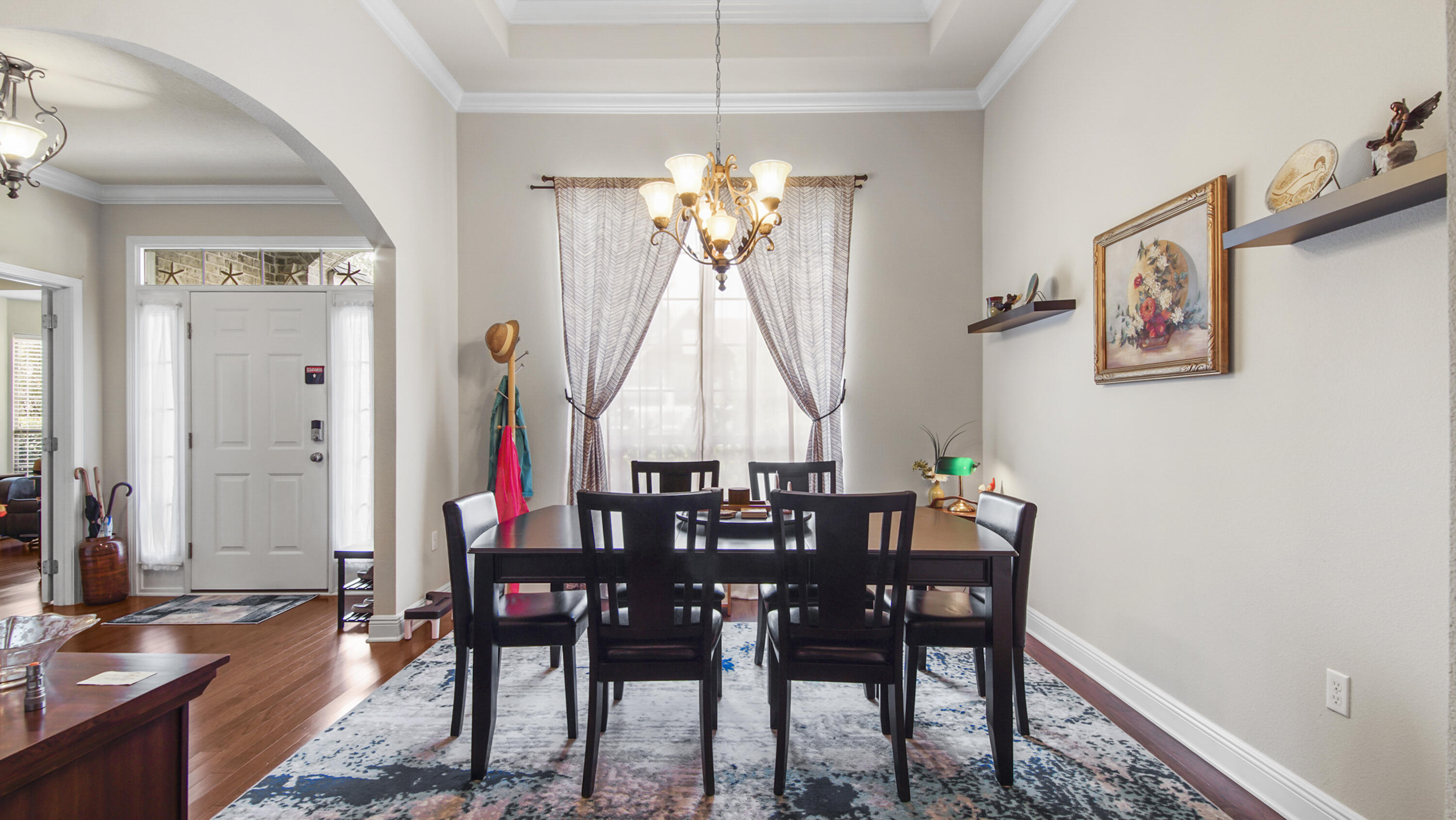 462 Mango Lane Freeport, FL 32439 - Photo 7 of 67 a view of a dining room with furniture window and wooden floor