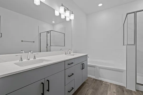 a bathroom with a sink and mirror