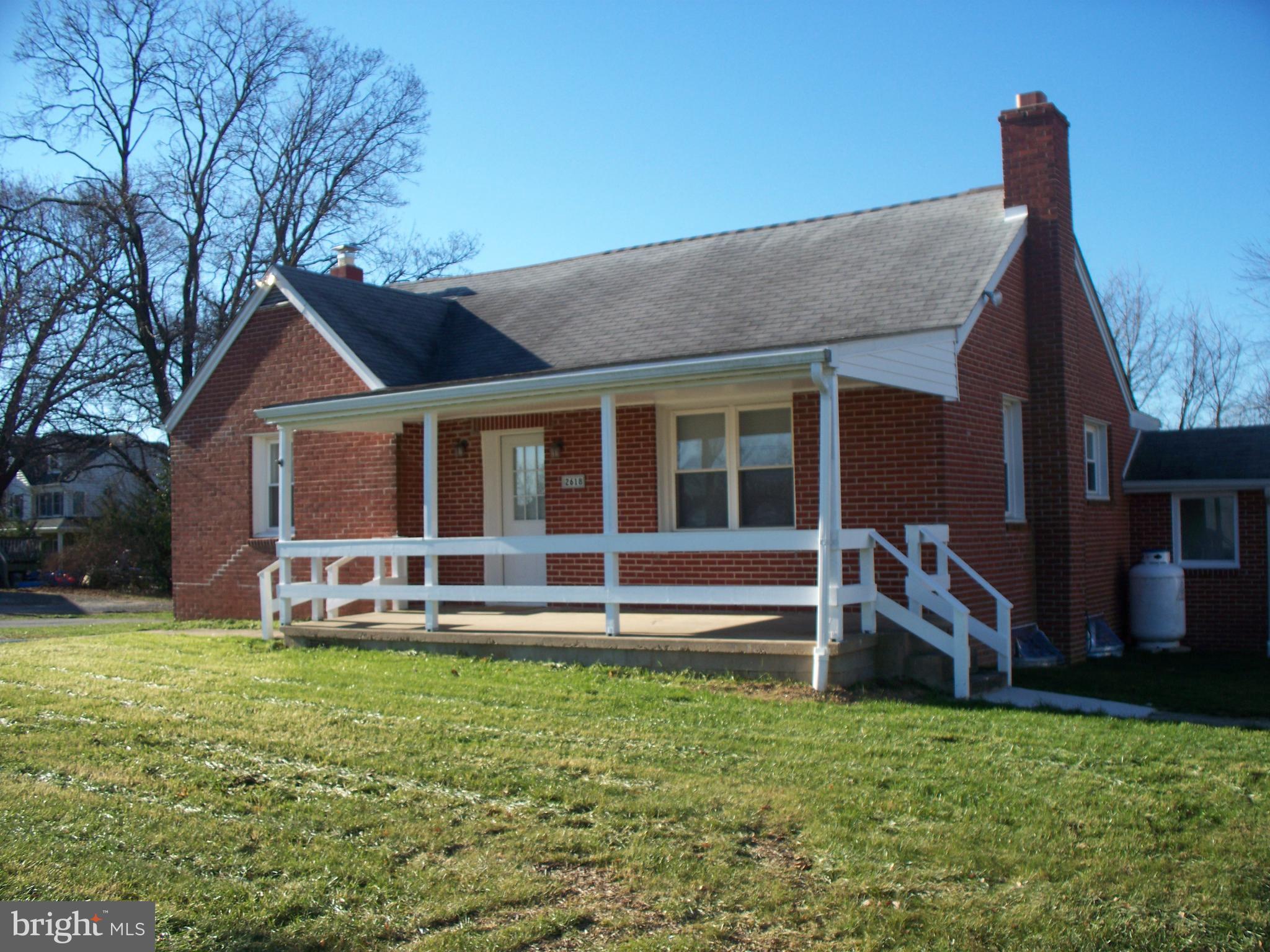 2618 Rocks Road Forest Hill, MD 21050 - Photo 2 of 20 a front view of a house with a yard