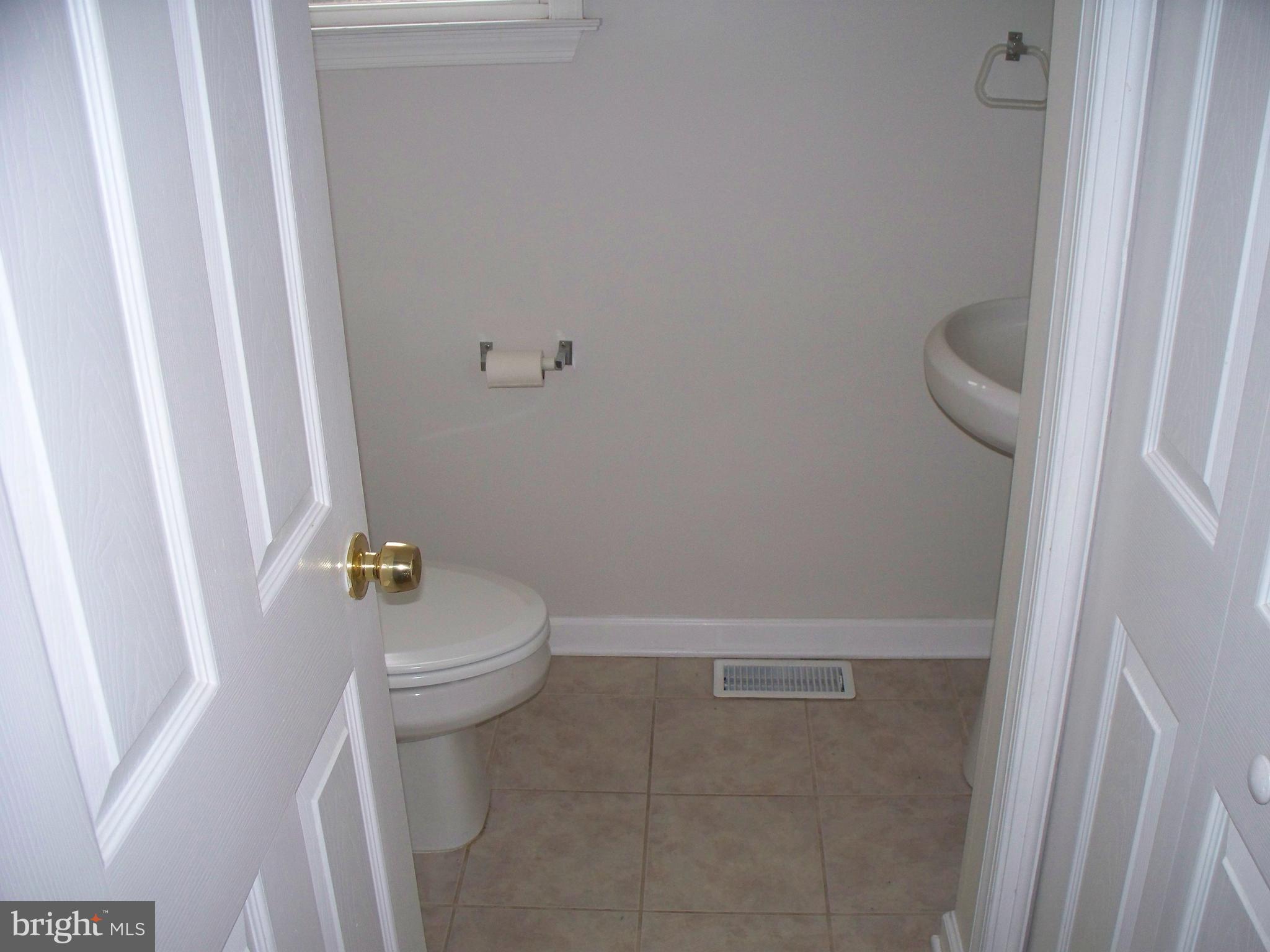 2618 Rocks Road Forest Hill, MD 21050 - Photo 12 of 20 a bathroom with a sink and toilet