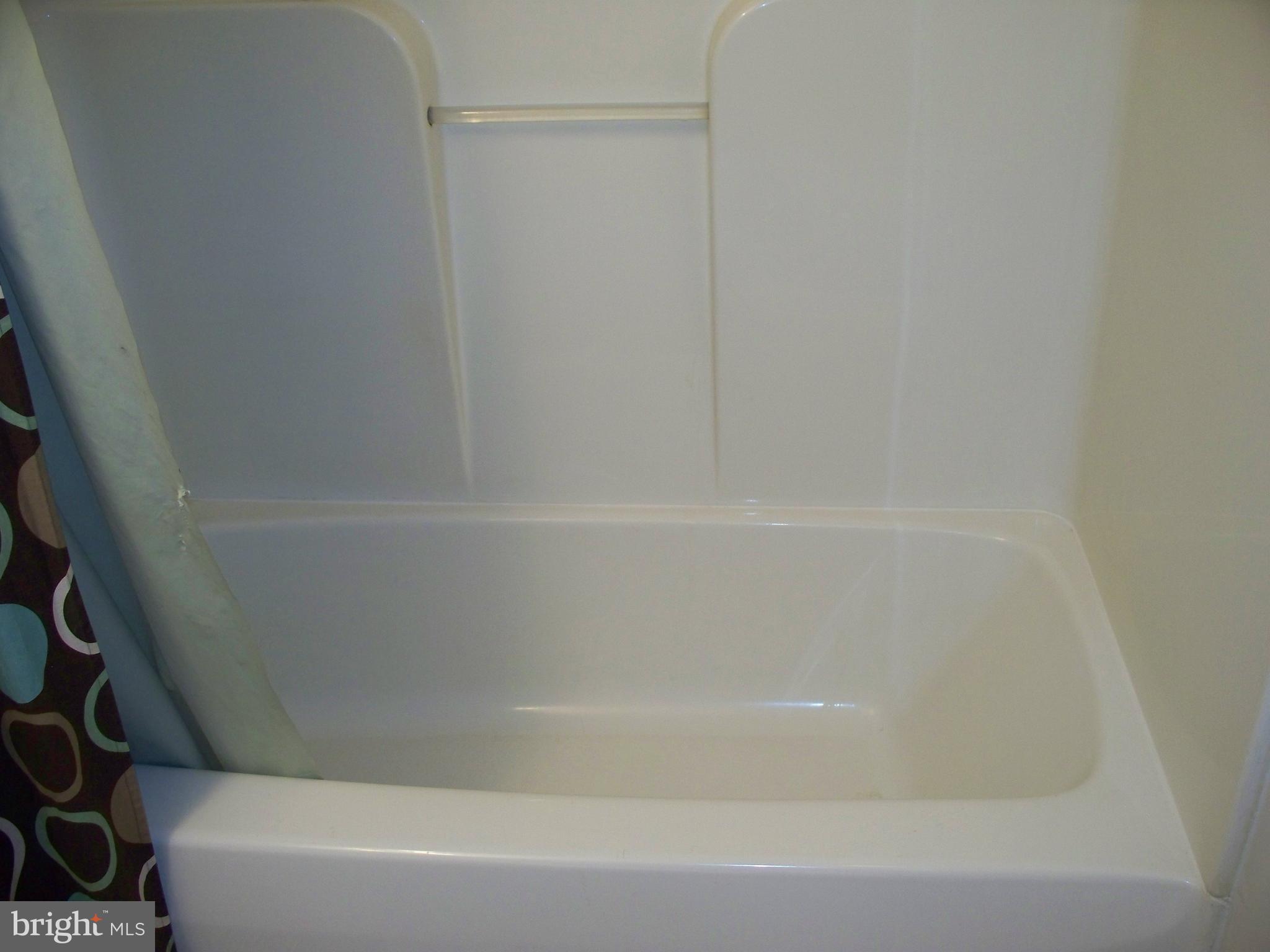 2618 Rocks Road Forest Hill, MD 21050 - Photo 15 of 20 a close up of a bathtub in a bathroom