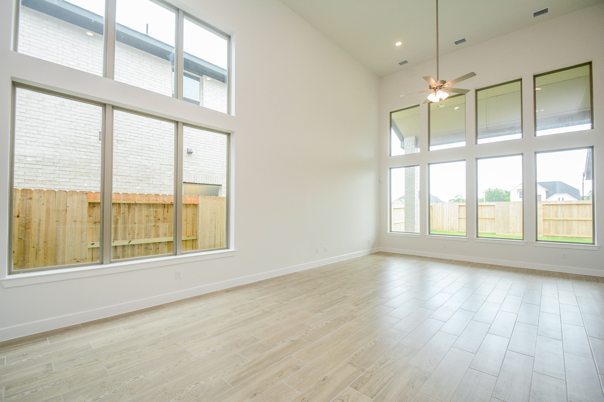 4407 Ruby Gdn Court Fulshear, TX 77441 - Photo 11 of 32 Spacious living area with large picture windows