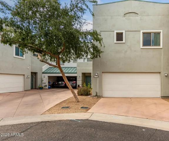 a house with trees in front of it