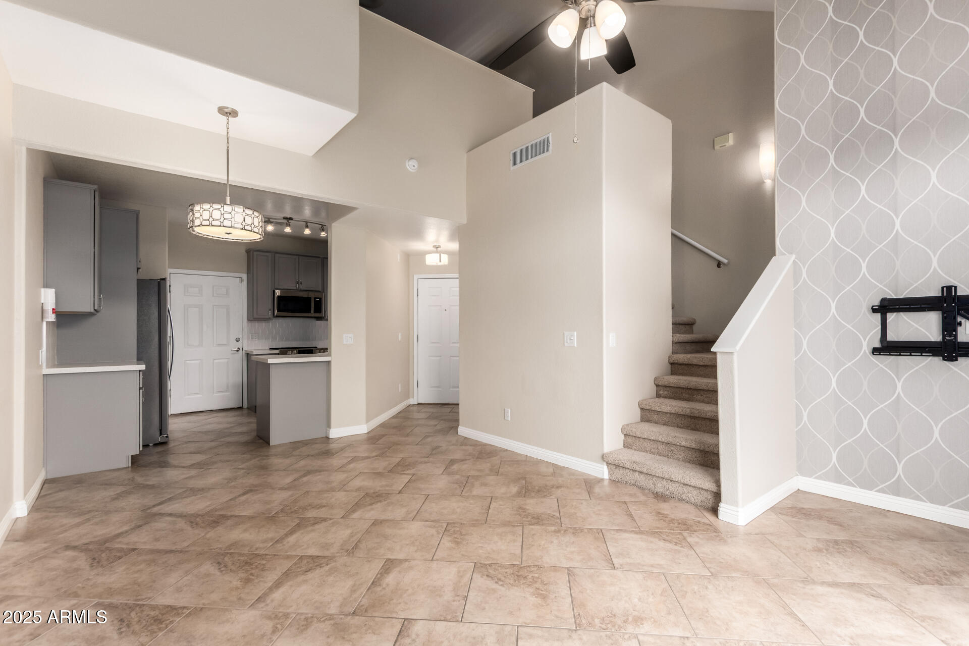 5400 South Hardy Drive, Unit 110 Tempe, AZ 85283 - Photo 7 of 31 a view of a kitchen with a sink cabinets and entryway