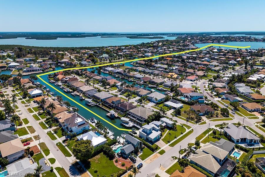 255 Columbus Way Marco Island, FL 34145 - Photo 1 of 50 an aerial view of a city