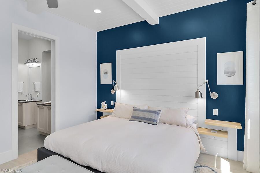 255 Columbus Way Marco Island, FL 34145 - Photo 20 of 50 a bedroom with a bed and a toilet
