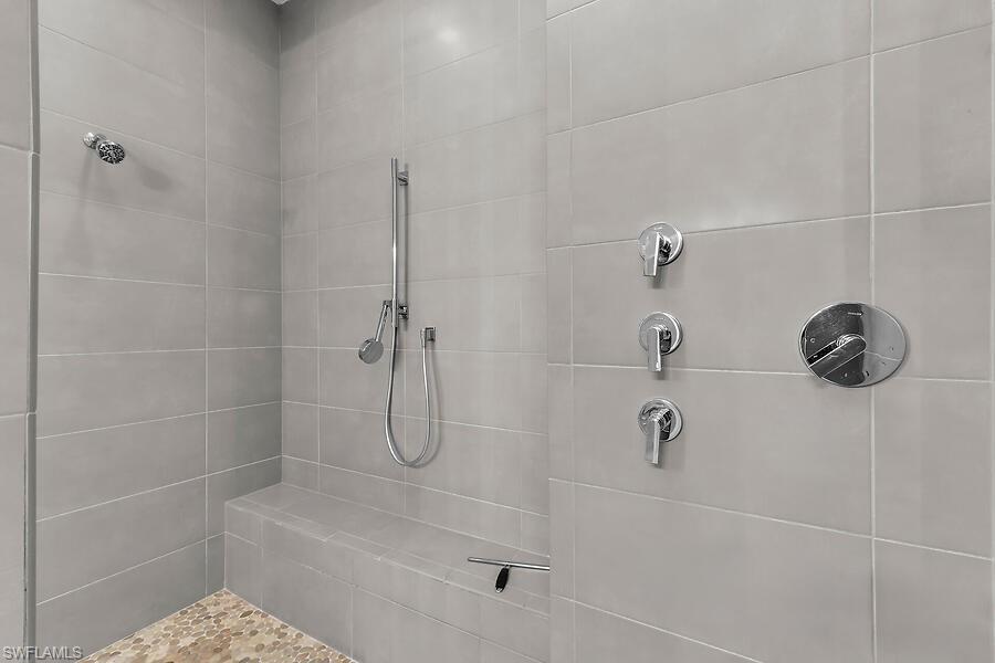 255 Columbus Way Marco Island, FL 34145 - Photo 21 of 50 a bathroom with a shower