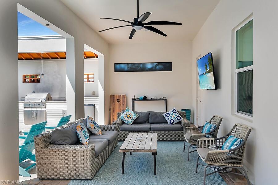 255 Columbus Way Marco Island, FL 34145 - Photo 24 of 50 a living room with furniture and a window
