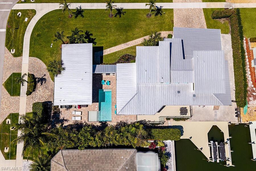 255 Columbus Way Marco Island, FL 34145 - Photo 27 of 50 an aerial view of a house with outdoor space