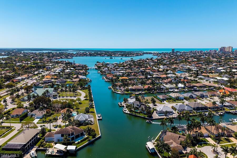 255 Columbus Way Marco Island, FL 34145 - Photo 29 of 50 an aerial view of a city with ocean view