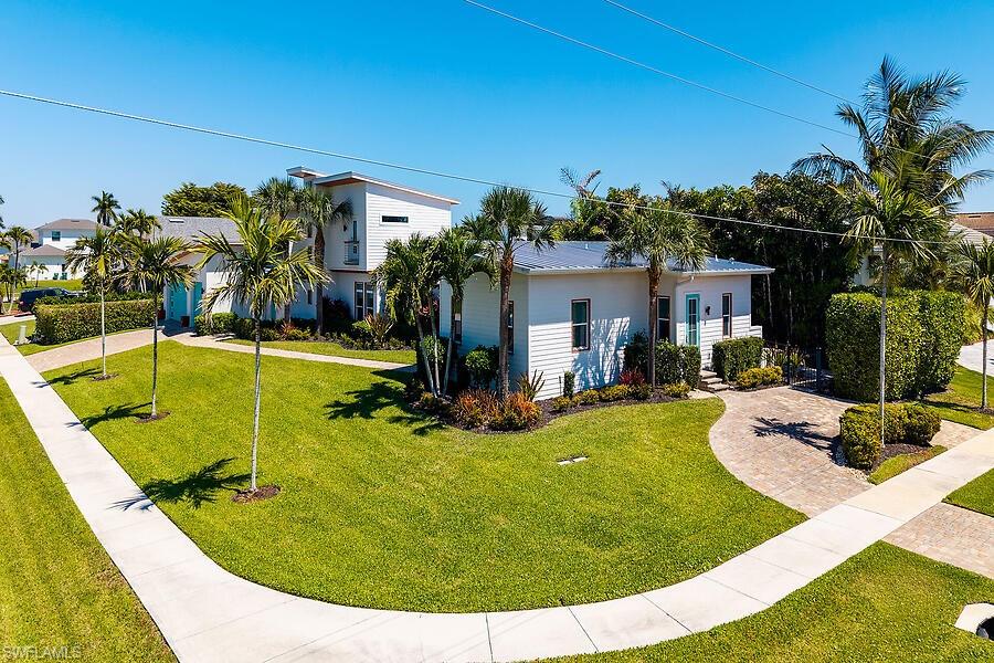 255 Columbus Way Marco Island, FL 34145 - Photo 42 of 50 a view of a swimming pool with a patio