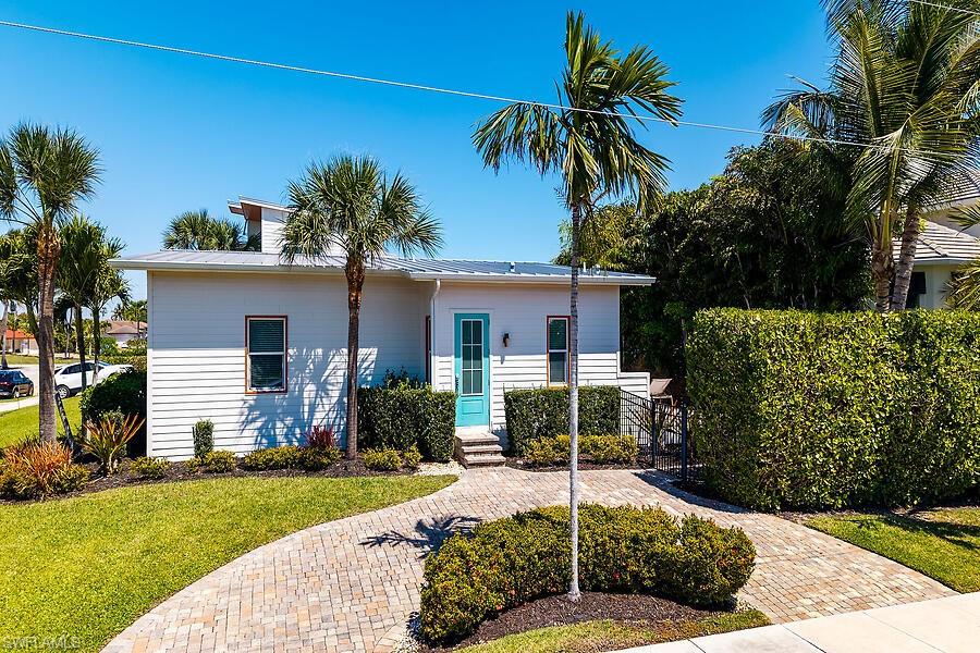 255 Columbus Way Marco Island, FL 34145 - Photo 49 of 50 a house view with a garden space