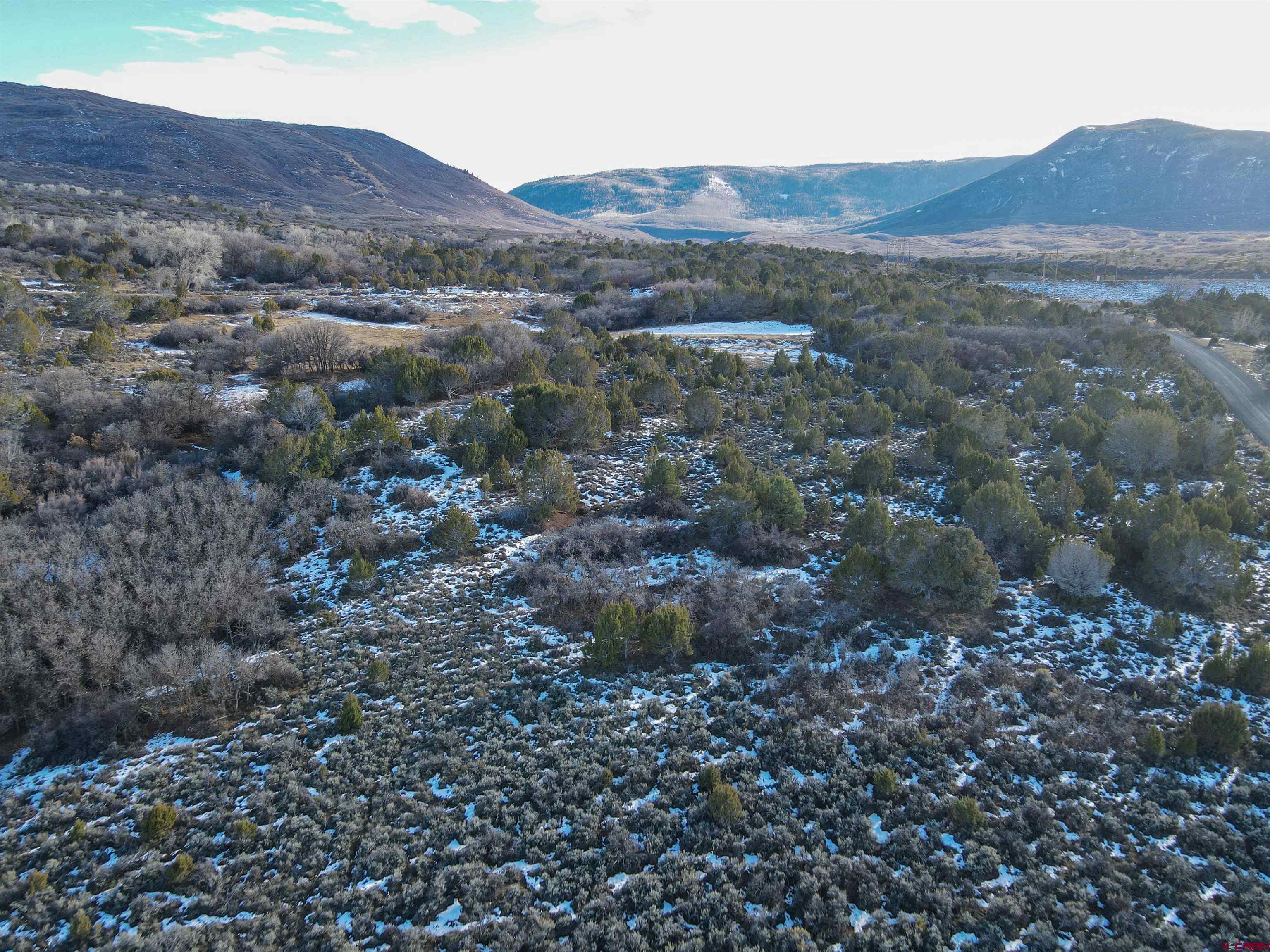 Tbd 56 1/4 Road Molina, CO 81646 - Photo 15 of 44 a view of a lush green hillside and houses