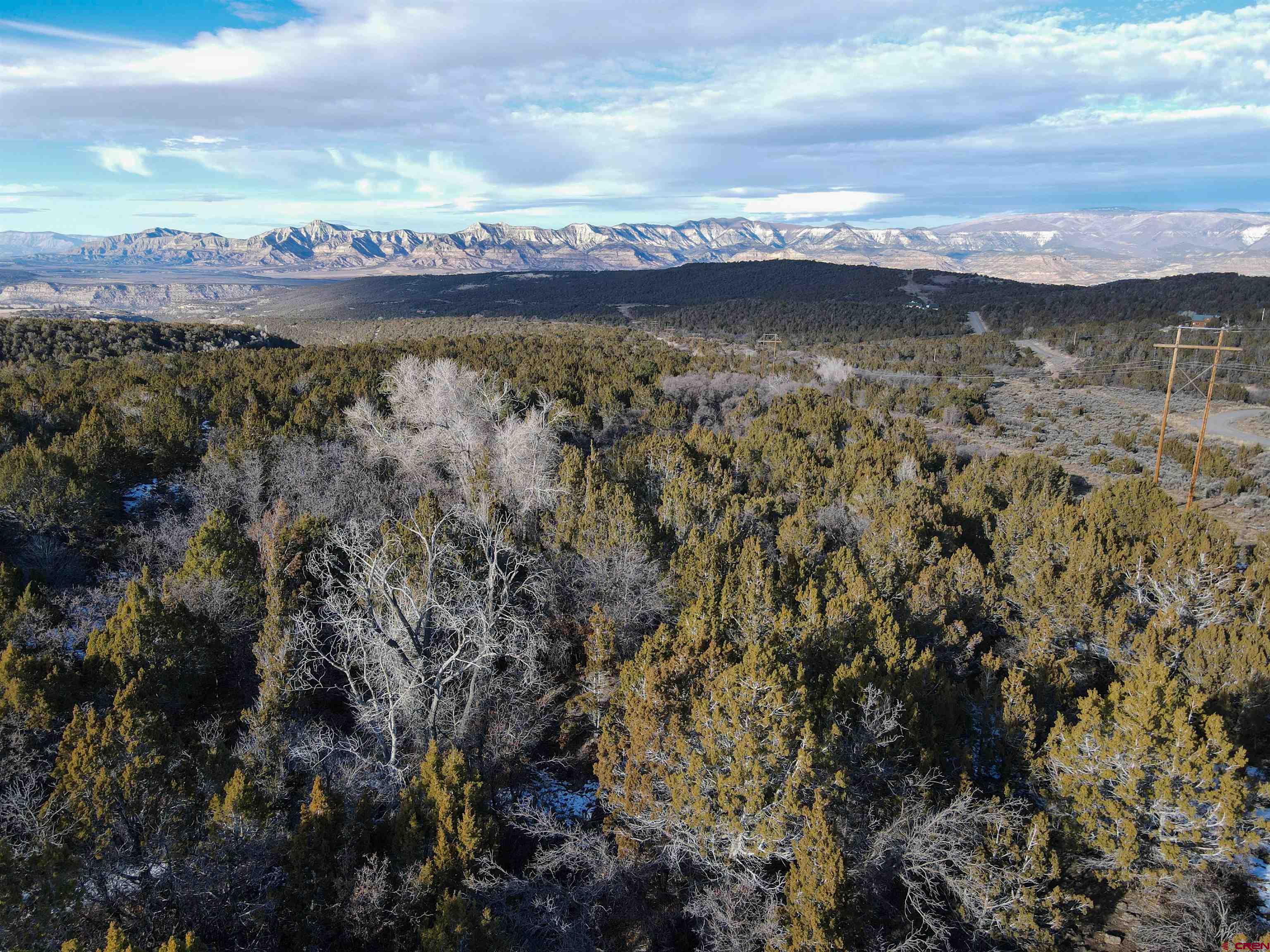 Tbd 56 1/4 Road Molina, CO 81646 - Photo 21 of 44 a view of a lake with mountains in the background
