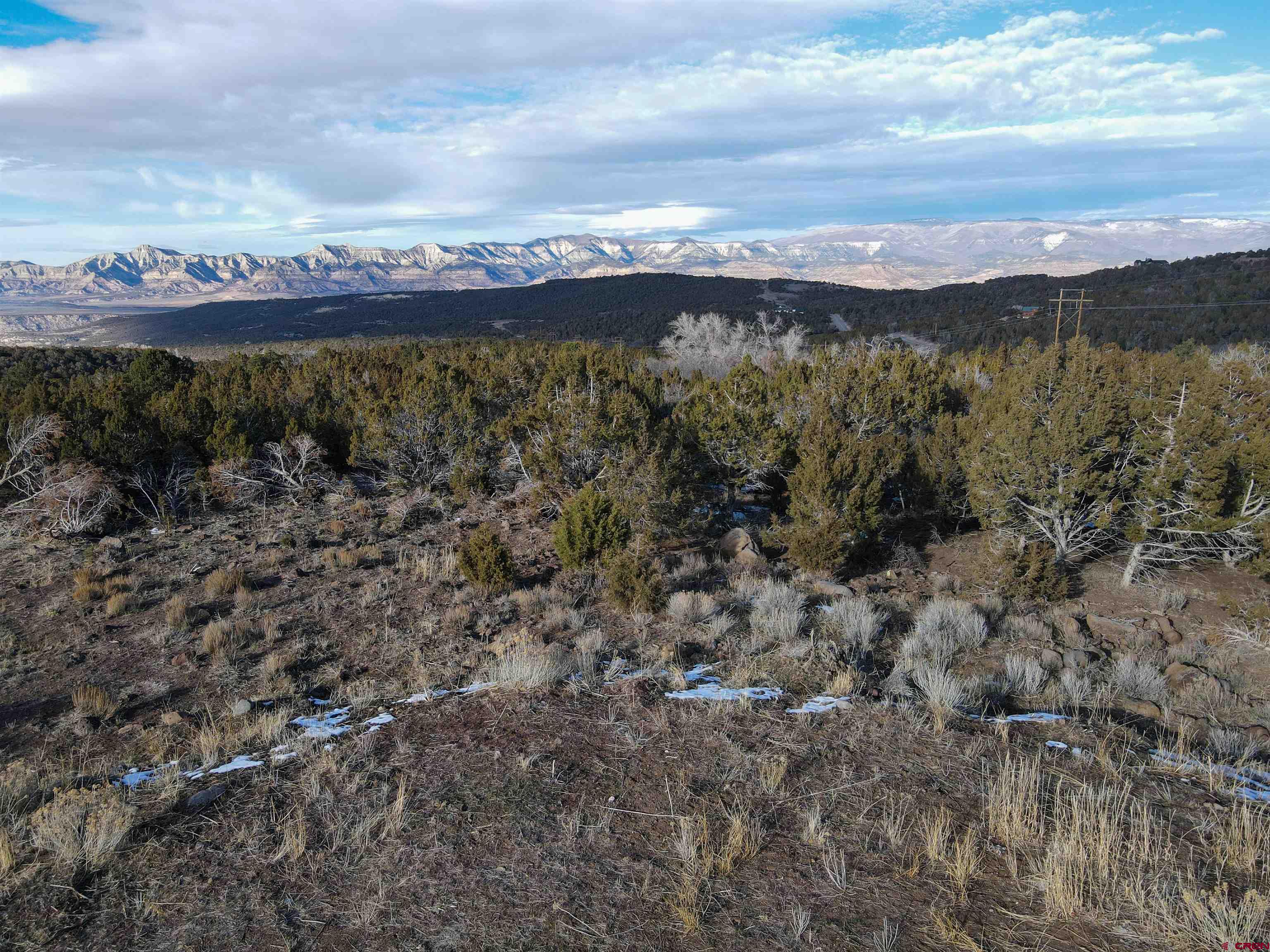 Tbd 56 1/4 Road Molina, CO 81646 - Photo 32 of 44 a view of a city with mountains in the background