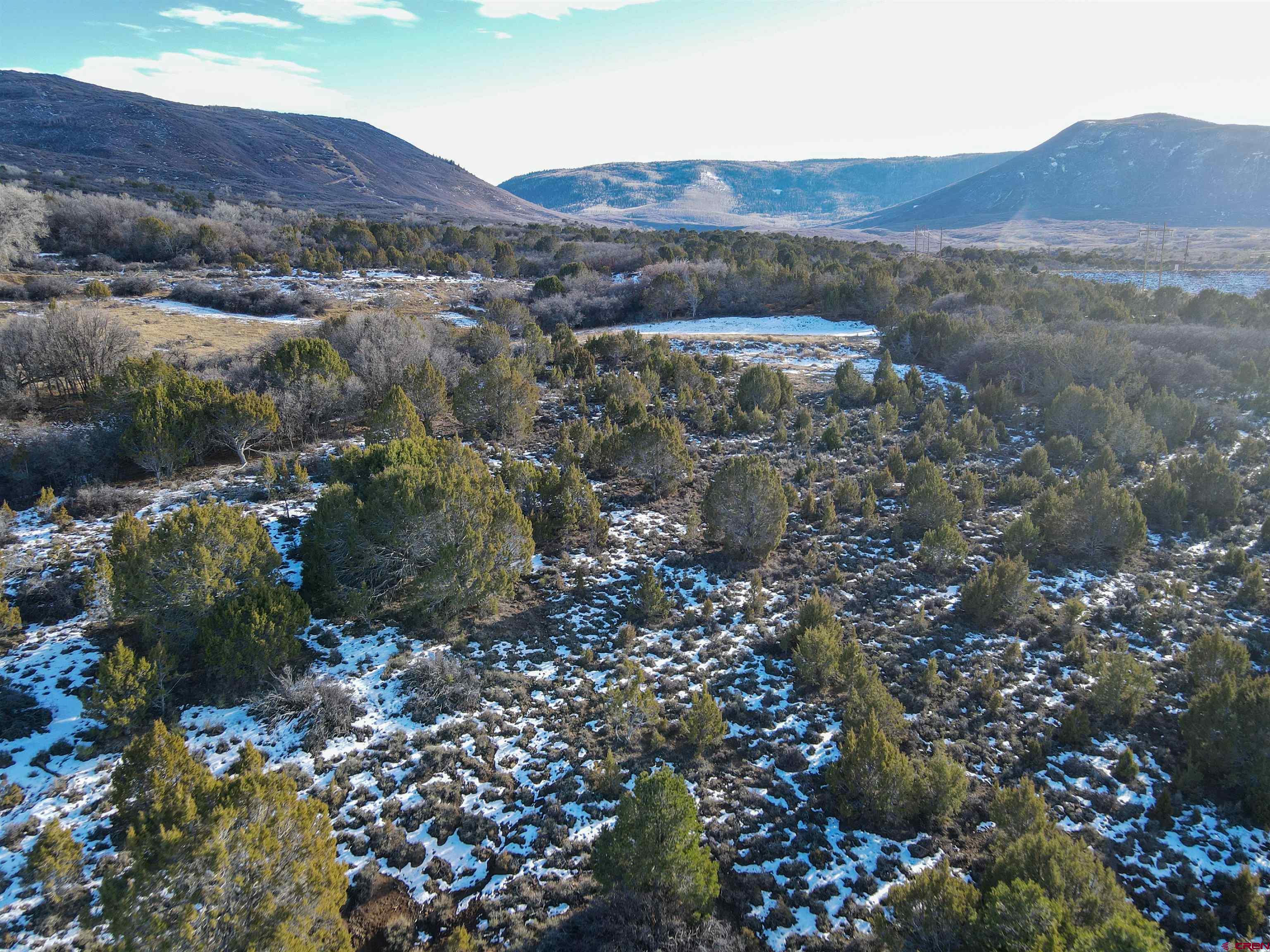 Tbd 56 1/4 Road Molina, CO 81646 - Photo 10 of 44 a view of a lush green hillside and houses
