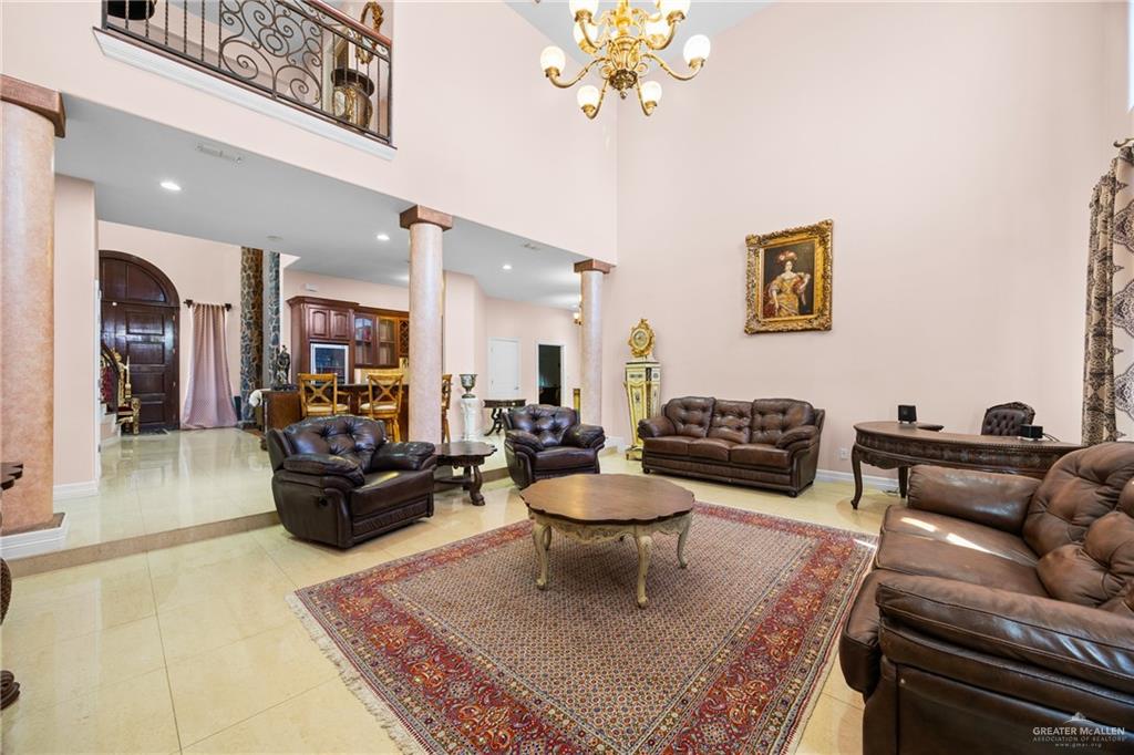 508 El Paisano Road Rio Grande City, TX 78582 - Photo 13 of 42 a living room with furniture and a chandelier