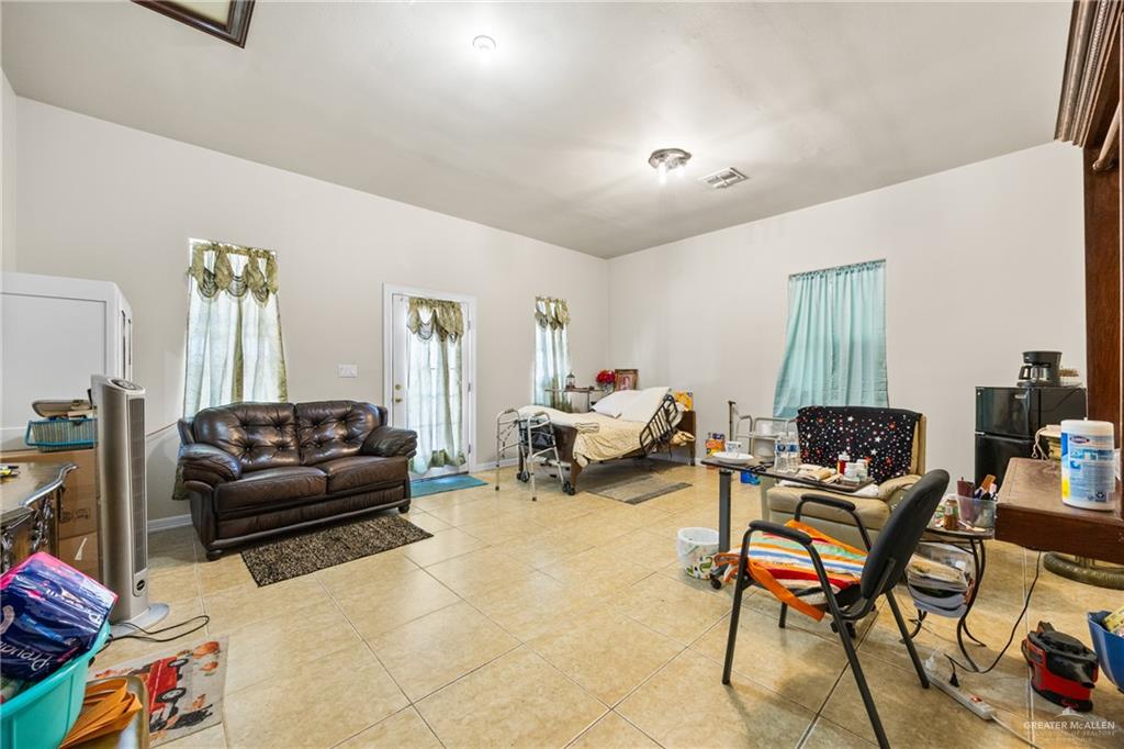 508 El Paisano Road Rio Grande City, TX 78582 - Photo 29 of 42 a living room with furniture and a window