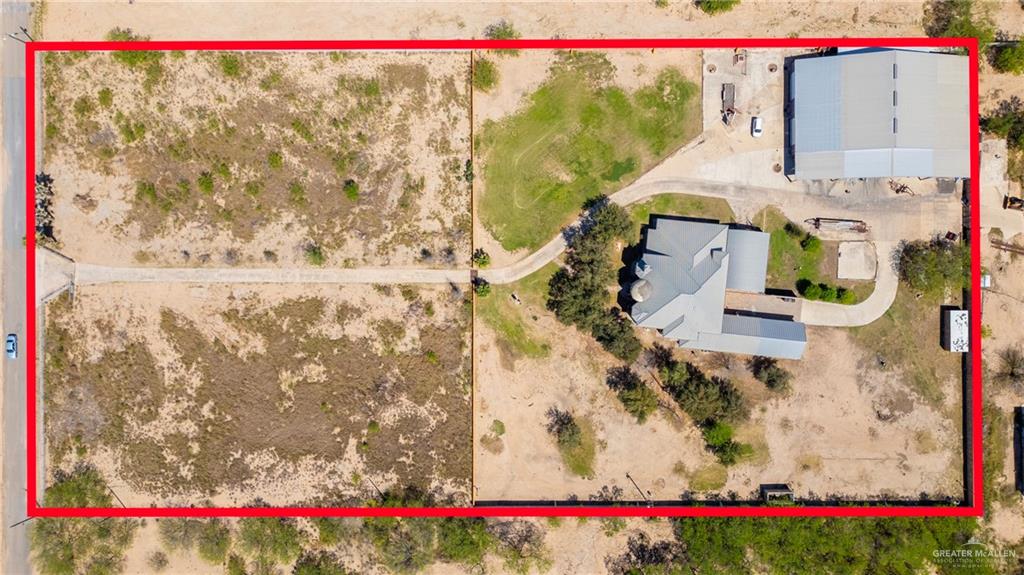 508 El Paisano Road Rio Grande City, TX 78582 - Photo 41 of 42 a picture of a park with large trees and plants