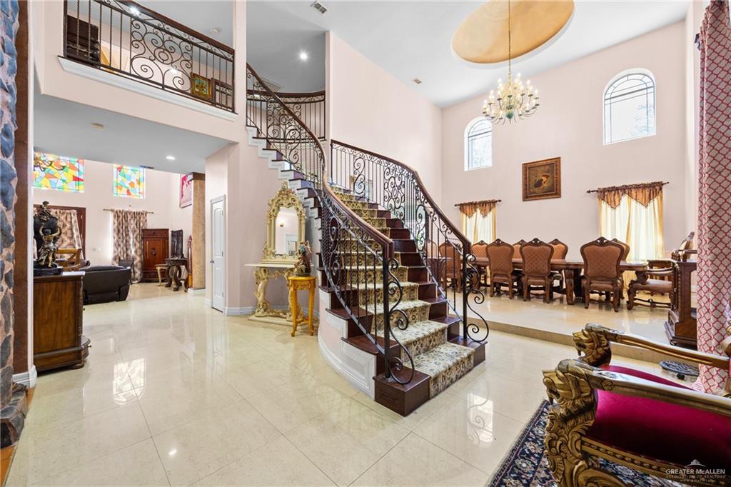 508 El Paisano Road Rio Grande City, TX 78582 - Photo 6 of 42 a view of entryway wih livingroom and stairs